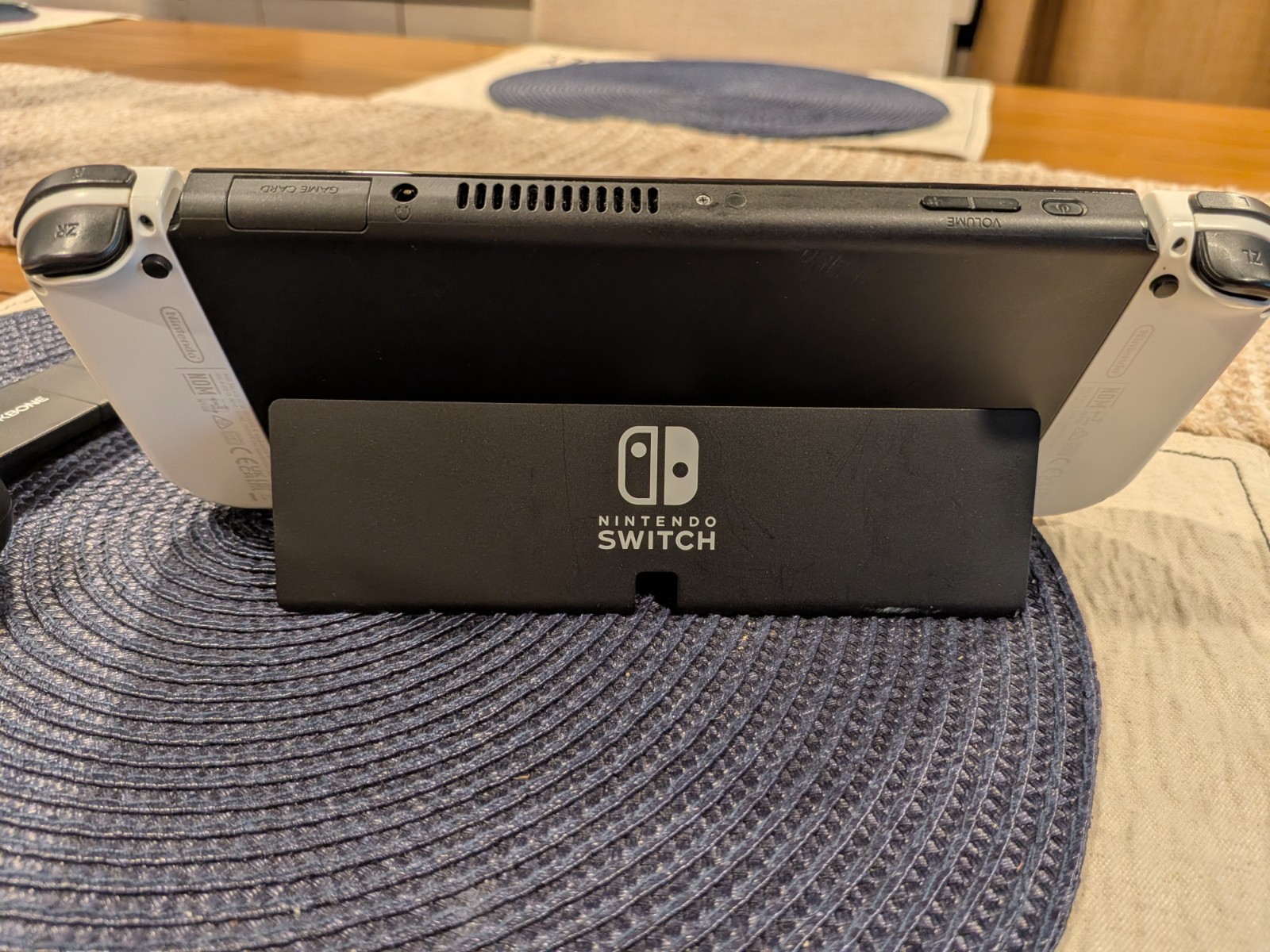 Nintendo Switch OLED- White with Backbone Handheld controller