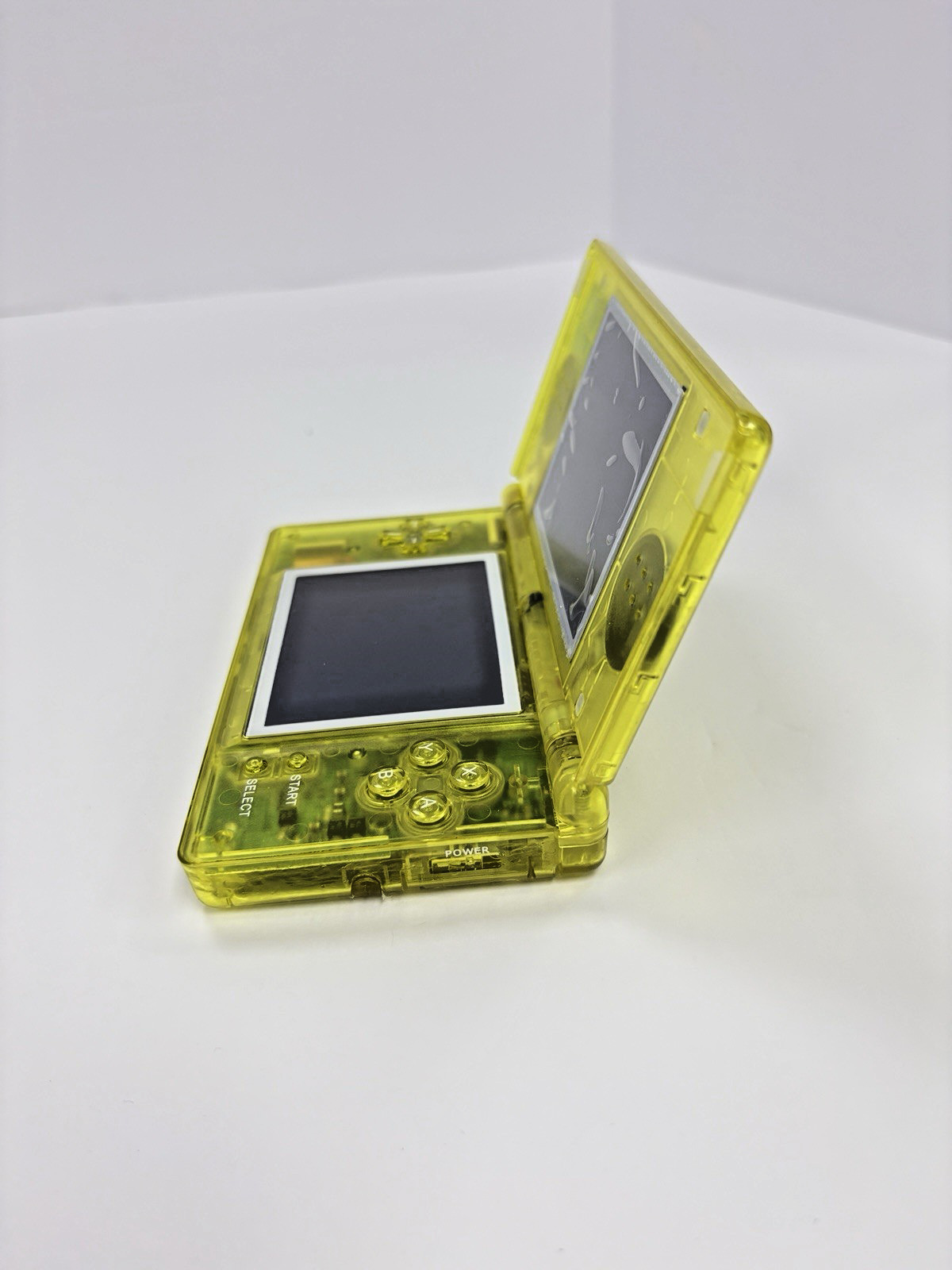 Refurbished Nintendo DS Lite – Transparent Yellow – New Shell