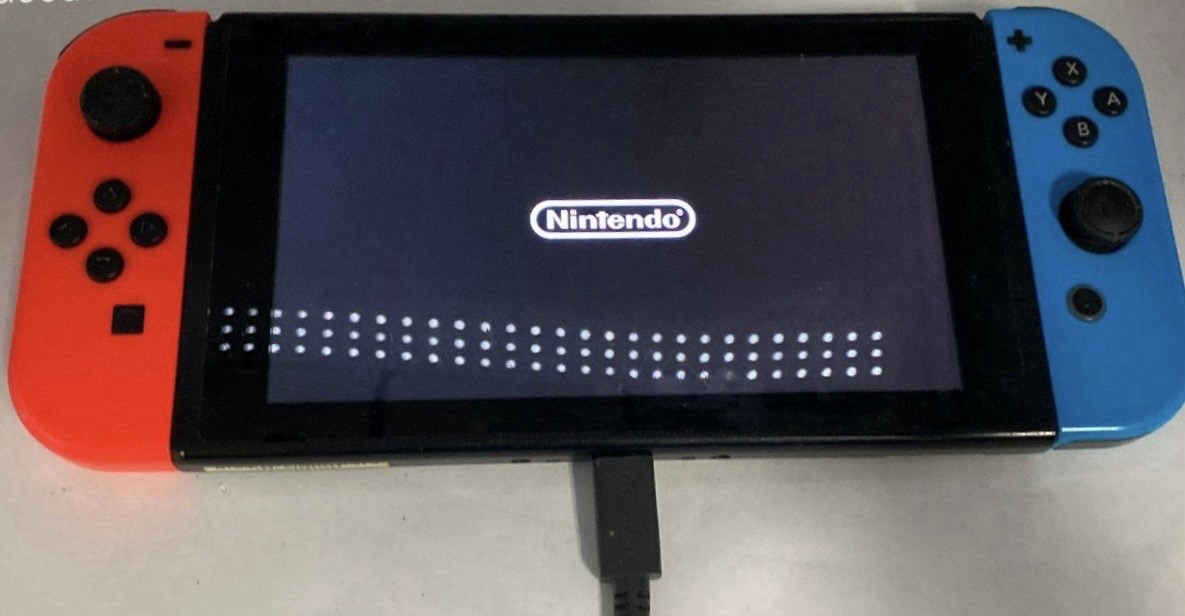 Nintendo Switch 32GB Gray Console with Neon Red and Neon Blue Joy-Con