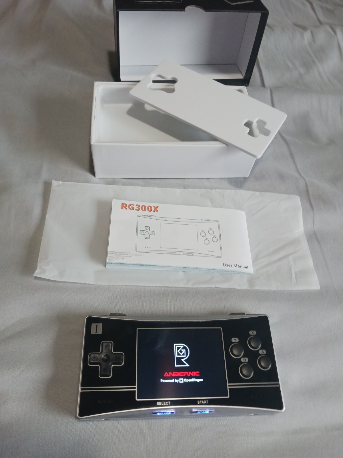 Anbernic RG 300x micro style console w original os 64GB & 16GB cards