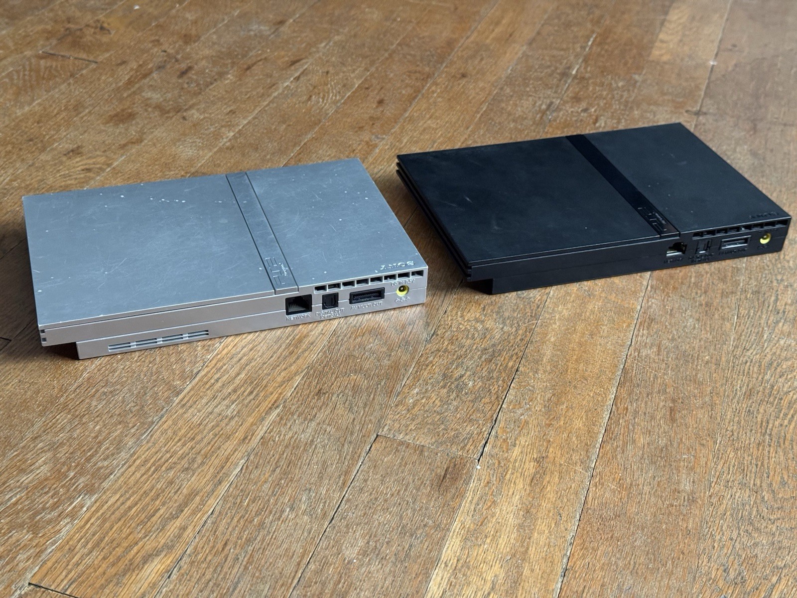Lot of two Sony Playstation 2 Slim Consoles PARTS OR REPAIR