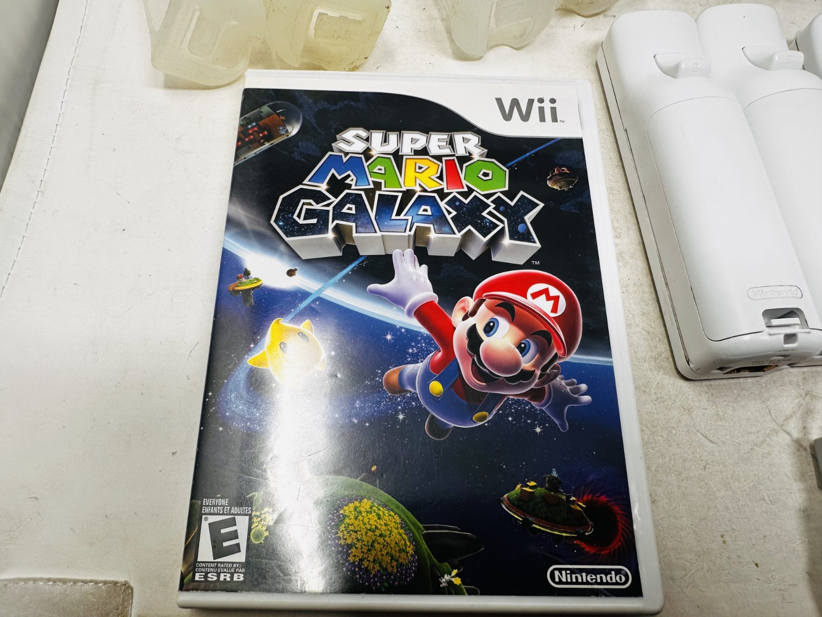 Nintendo Wii Console Lot – 4 Controllers 4 Nunchucks w/ Mario Super Galaxy WORKS
