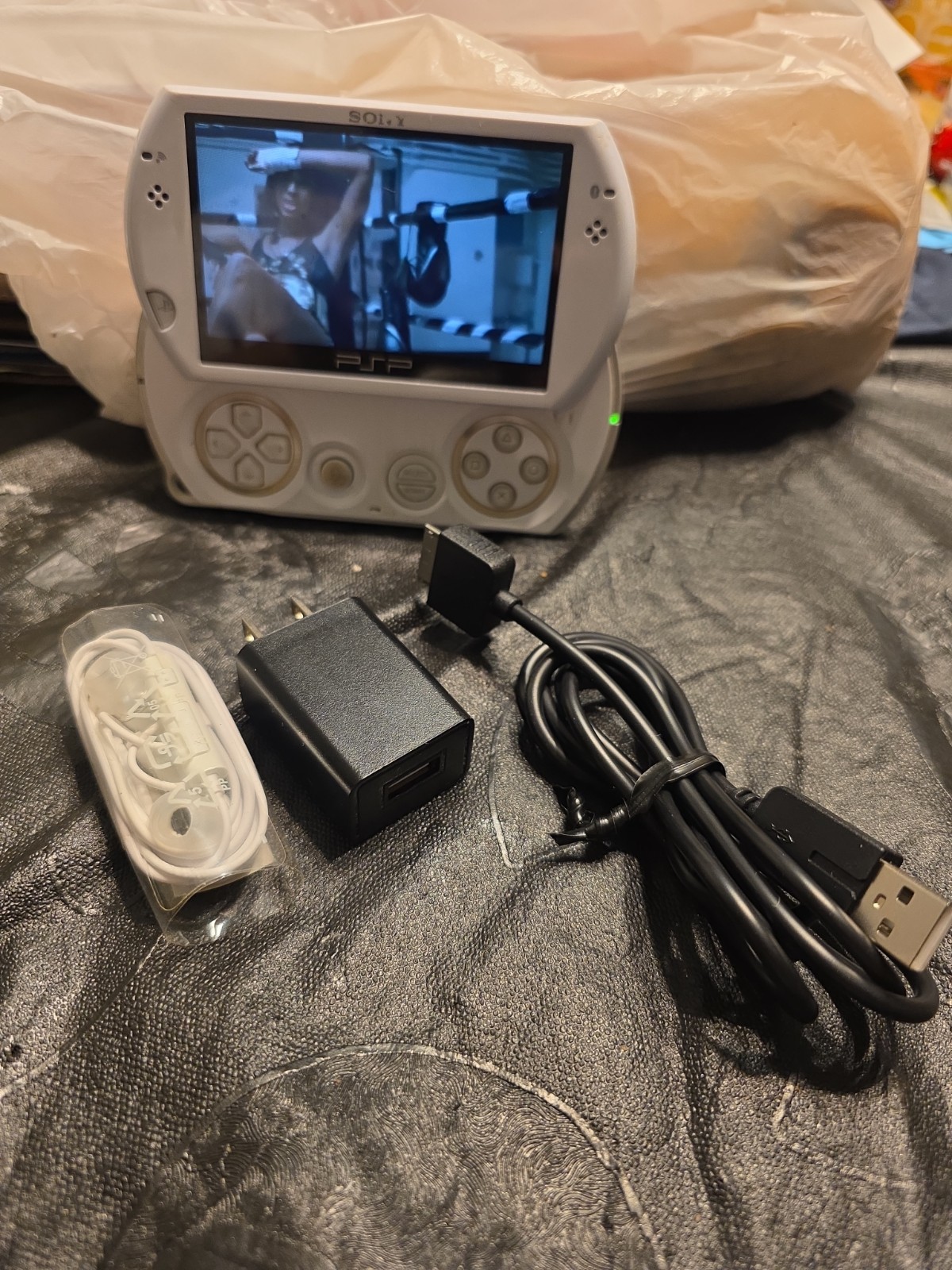Sony PSP N1001 Works Loaded W/games And Music ,videos, new Ear Buds &charger
