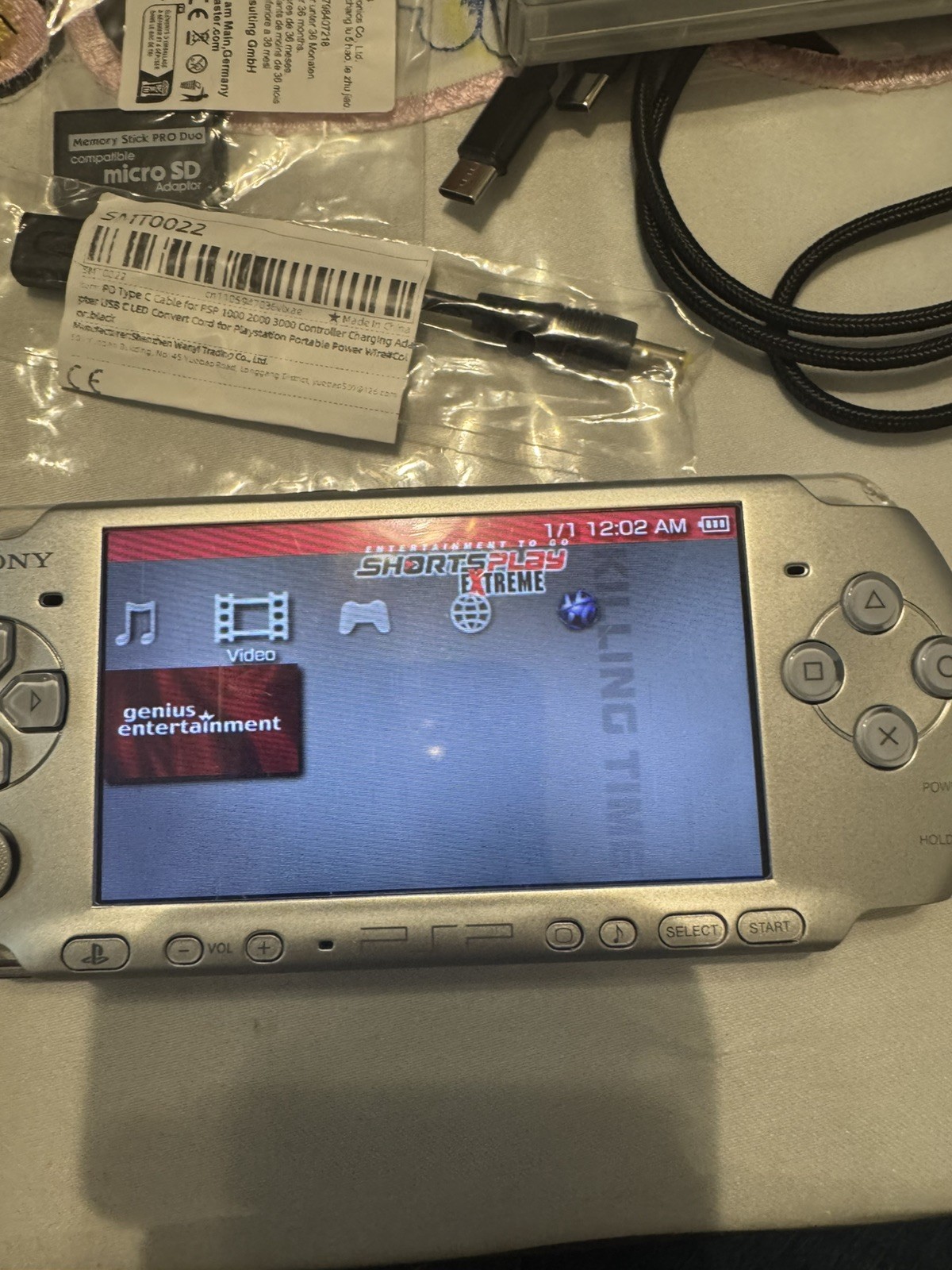 Sony PSP 3001 Silver Platinum System New battery with 2movies and 2games bundle