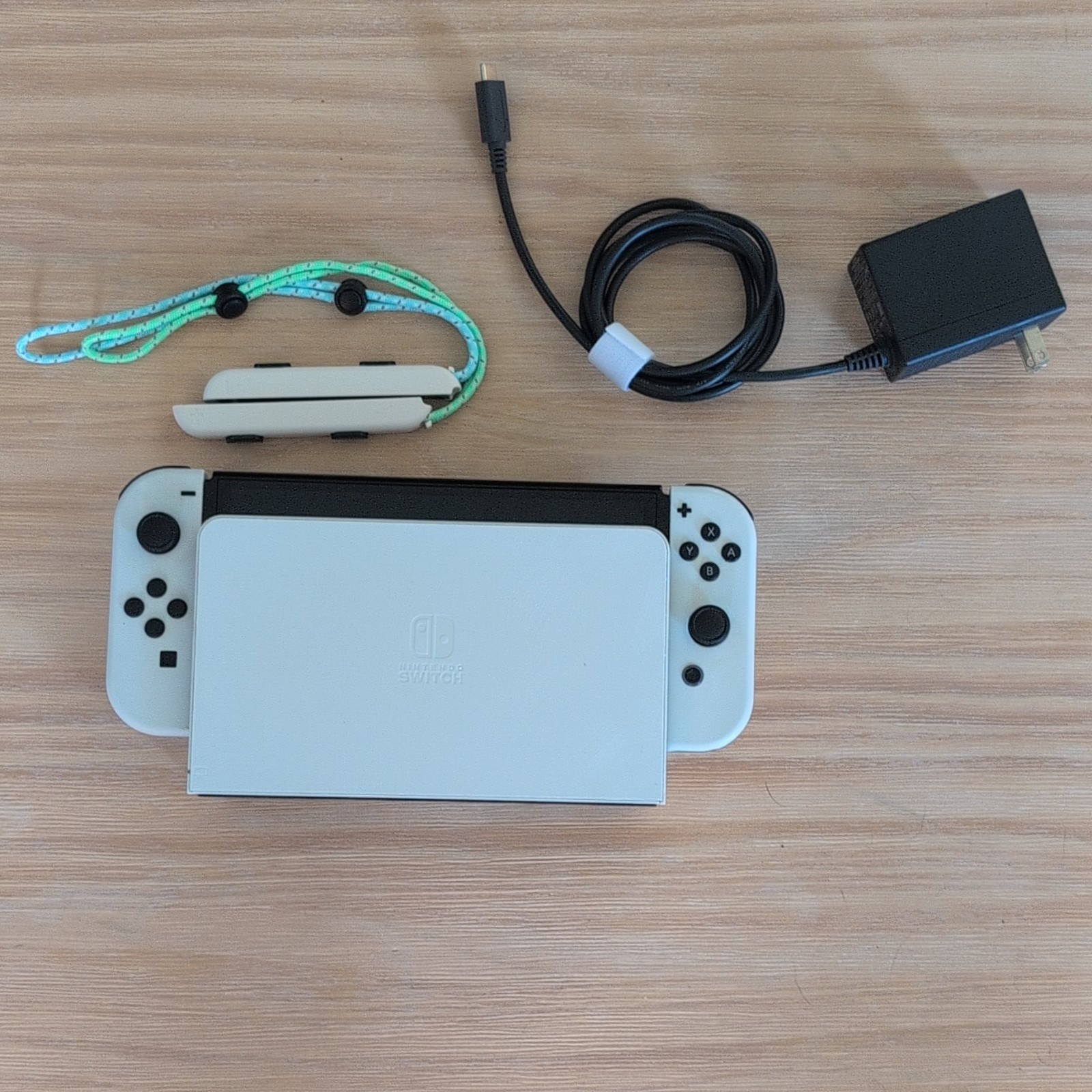 Nintendo Switch OLED White 64GB w/ Joy-Cons, Dock, AC Adapter, and 64GB MicroSD