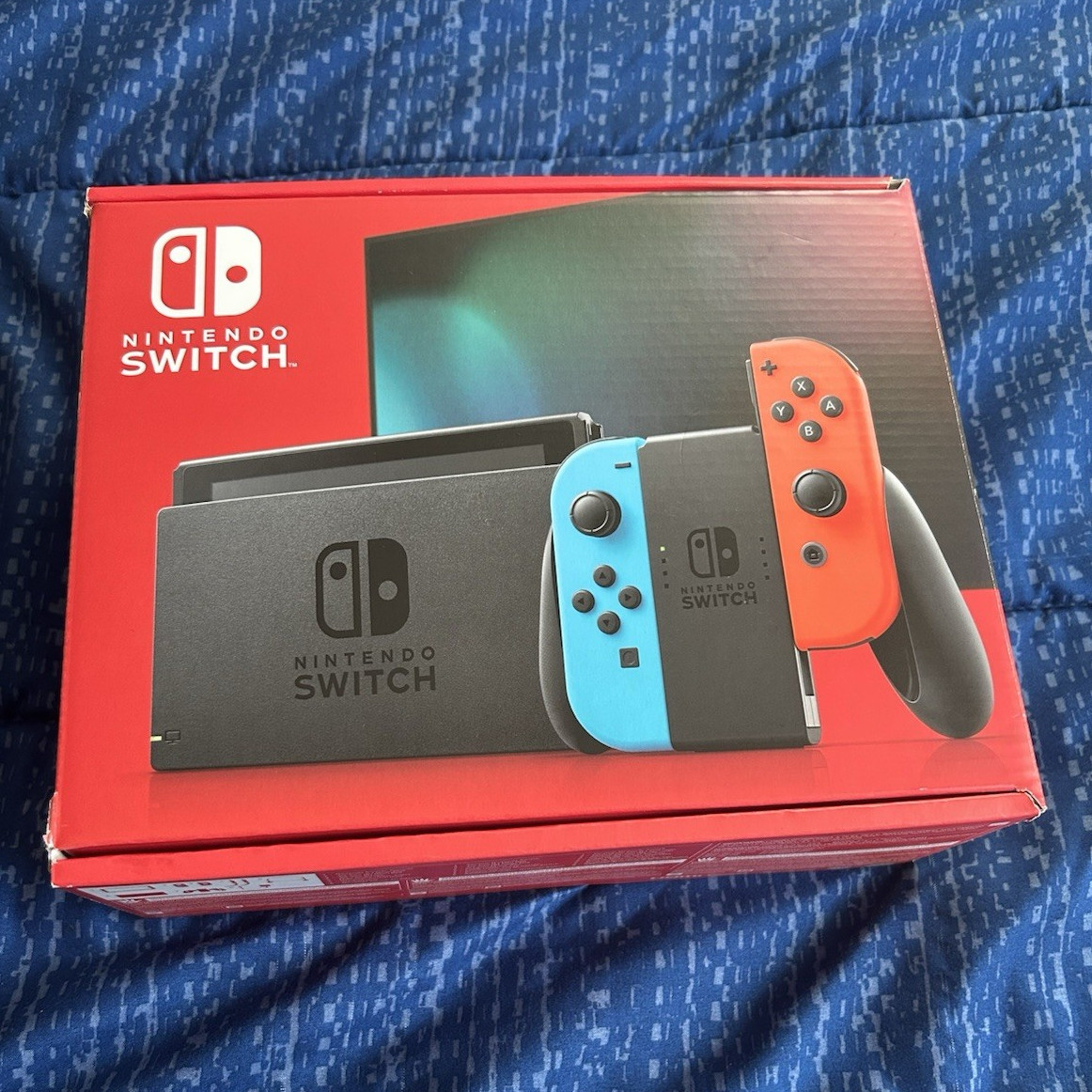 Nintendo Switch Console w/ Neon Red/Neon Blue Joy-Con Controllers