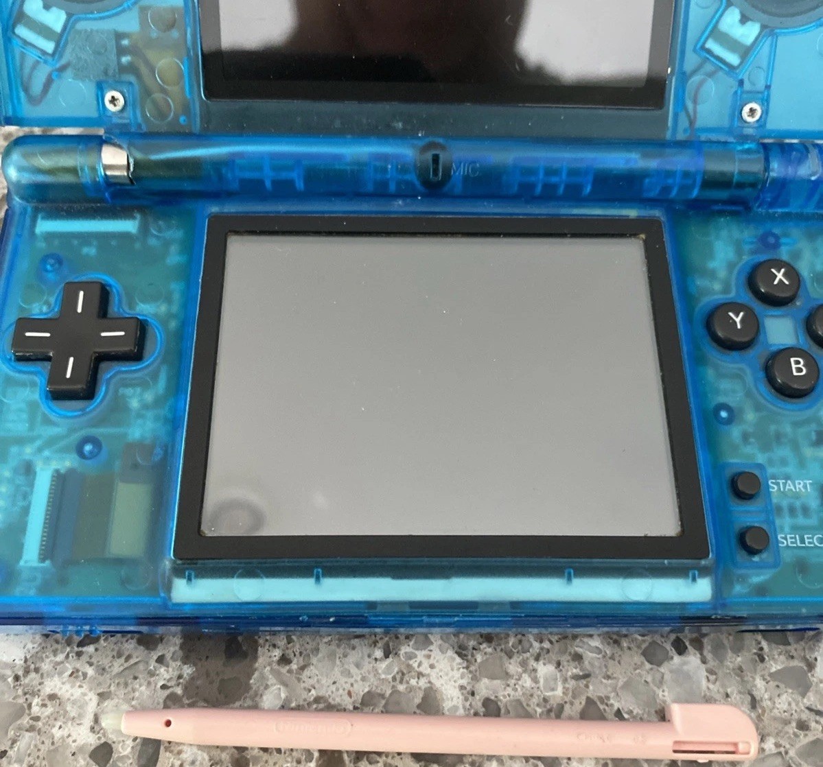 Nintendo DSi Handheld Game Console Clear Blue – No Charger – Pink Stylus