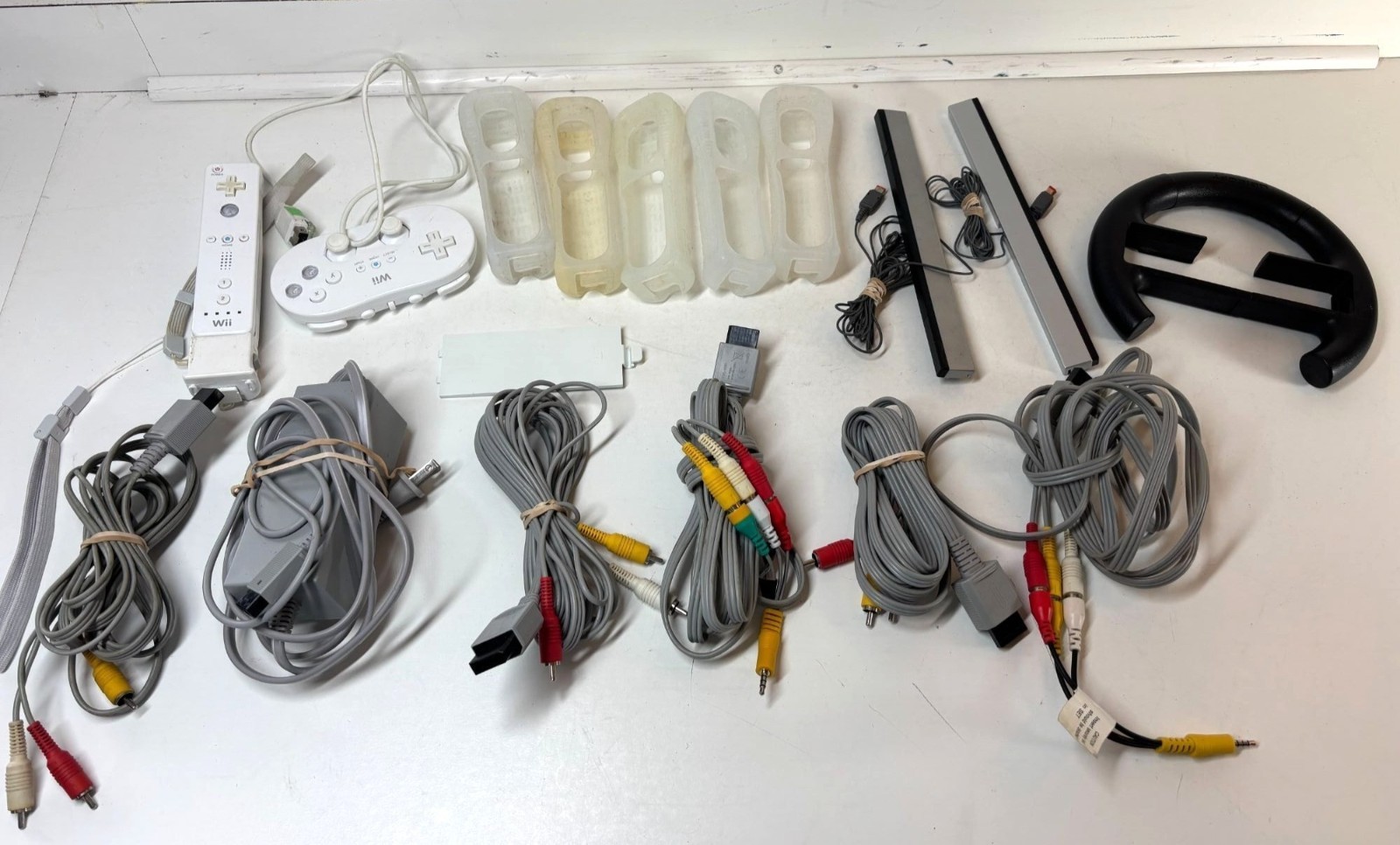 Nintendo Wii Controllers & Accessories Bundle With Cables Sensor Bars & Wheel
