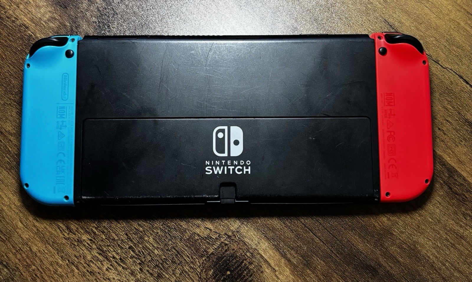 Nintendo Switch OLED with 6 Games Carrying Case Charger Dock Wireless Controller