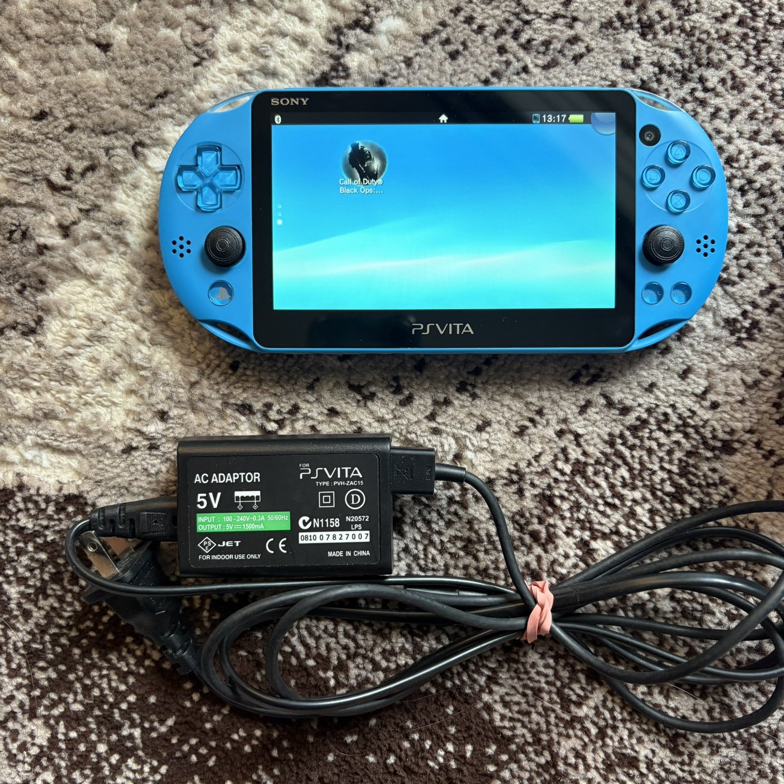 PS Vita Blue PCH-2000 ZA23 Slim Aqua Bundle, 2 Games + Charger 16GB Memory