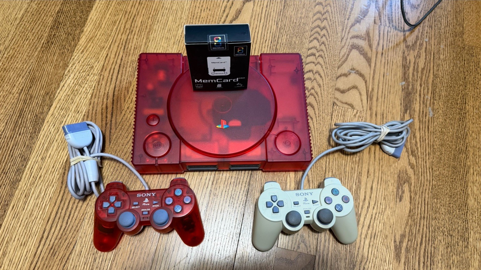 Red PlayStation 1 w/ XStation Recapped Laser Bear Controllers IGR MemCard Pro