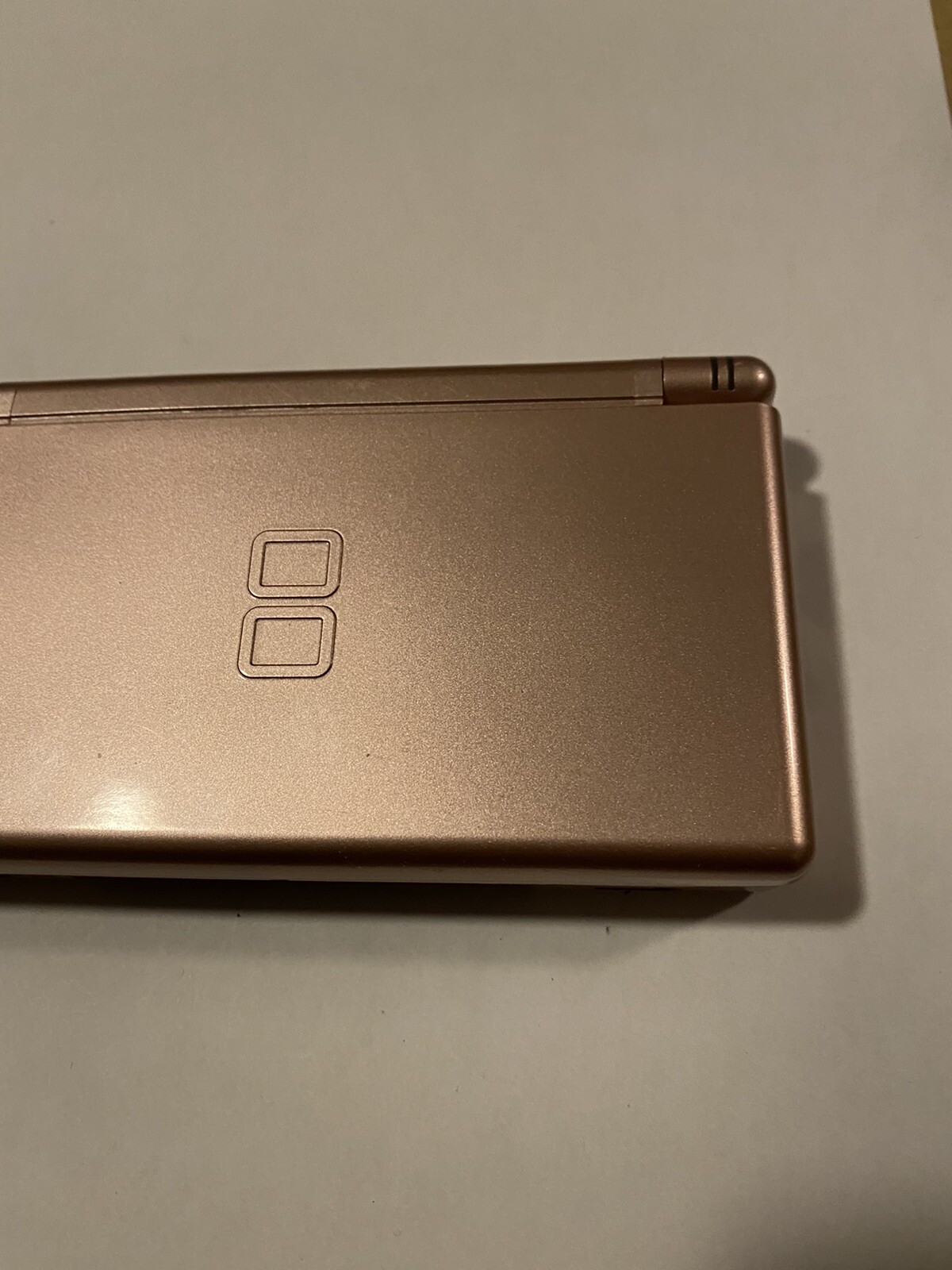 Nintendo DS Lite Metallic Rose Handheld System For Parts And Repair Unit
