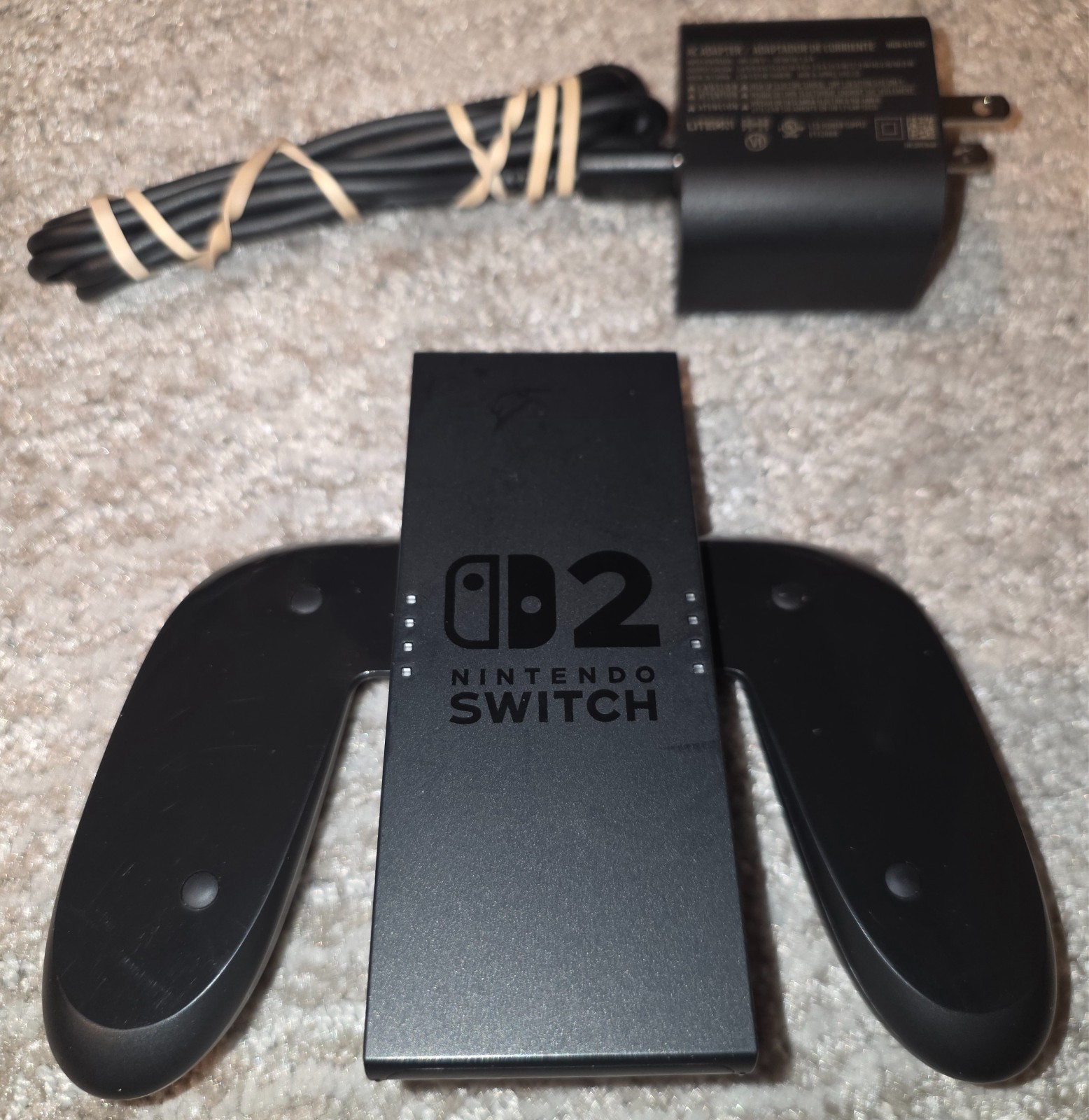 Nintendo Switch 2 with original items PLUS Dbrand skin and killswitch case