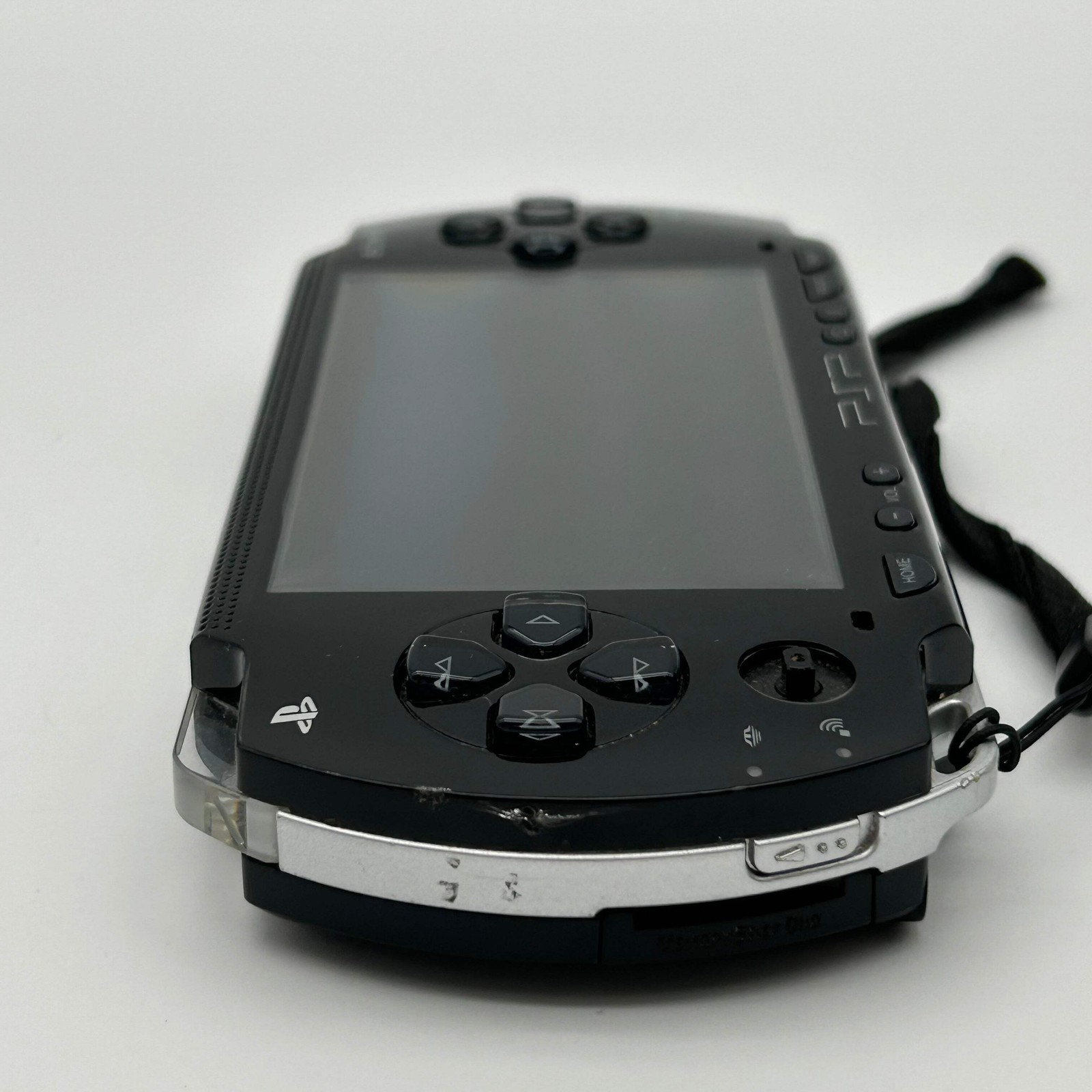 Sony PSP 1001 – 9 Game Bundle | Logitech Amp | Tested / Needs Battery – Used