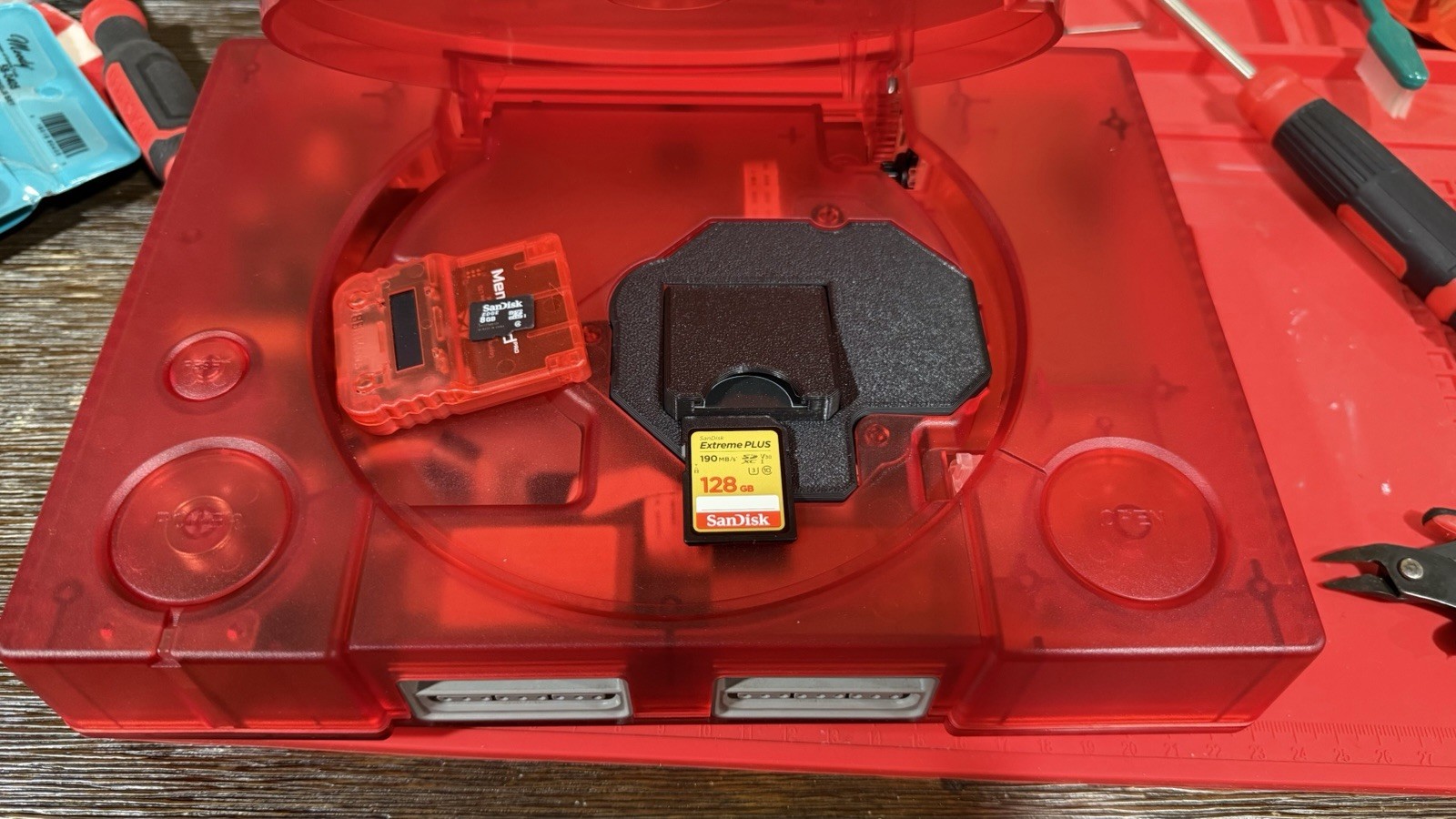 Red PlayStation 1 w/ XStation Recapped Laser Bear Controllers IGR MemCard Pro