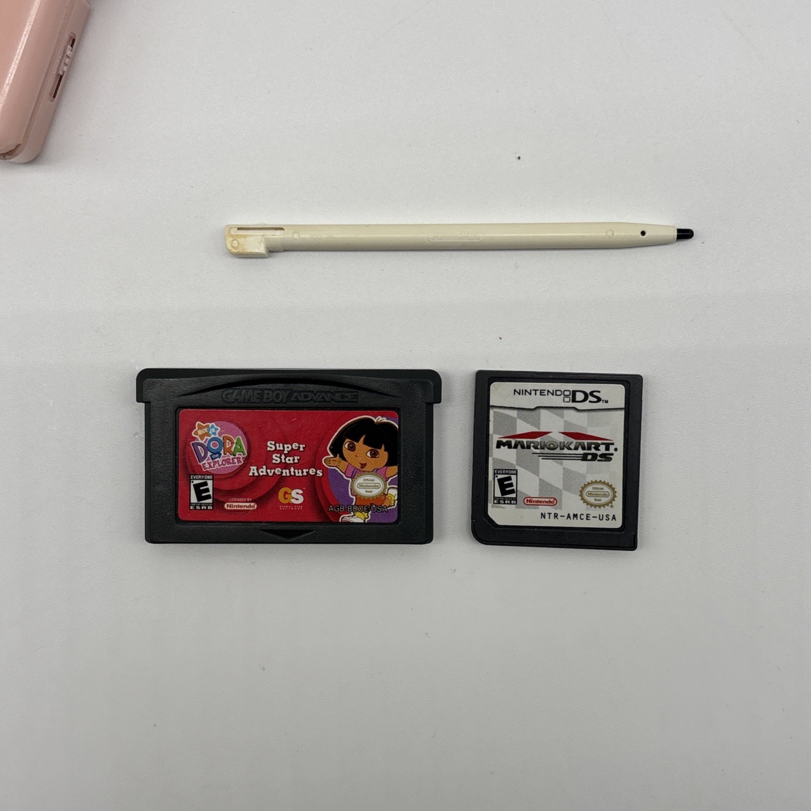 Nintendo DS Lite Metallic Rose W/ Mariokart & Dora – Stylus – NO CHARGER -WORKS