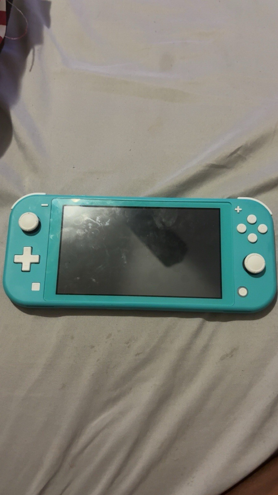 Nintendo Switch Lite Turquoise Handheld Console Wi-Fi Capability Headphone Jack