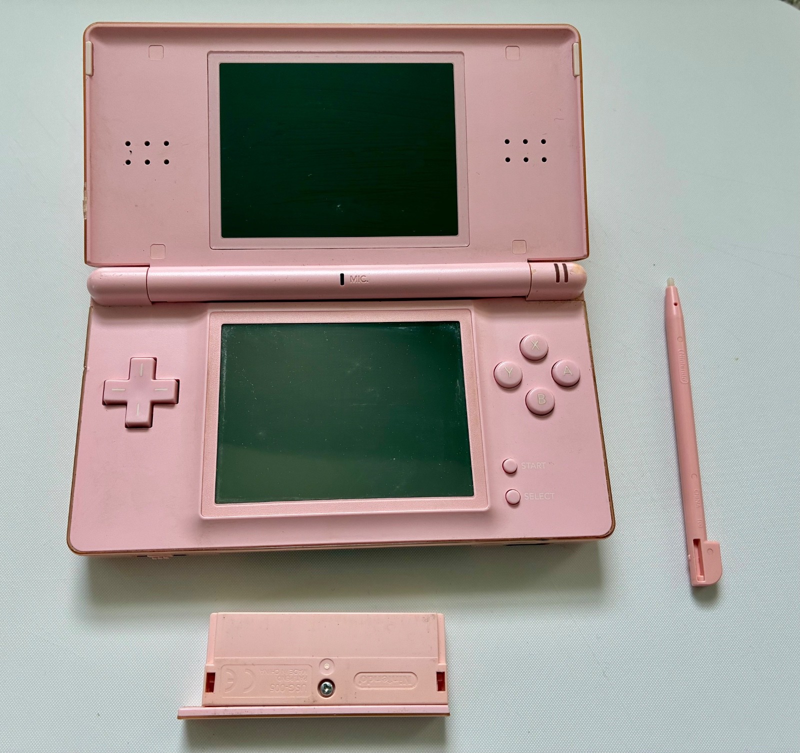 Nintendo DS Lite Handheld Console with Stylus and GBA Cover. Works, Cracks- Pink