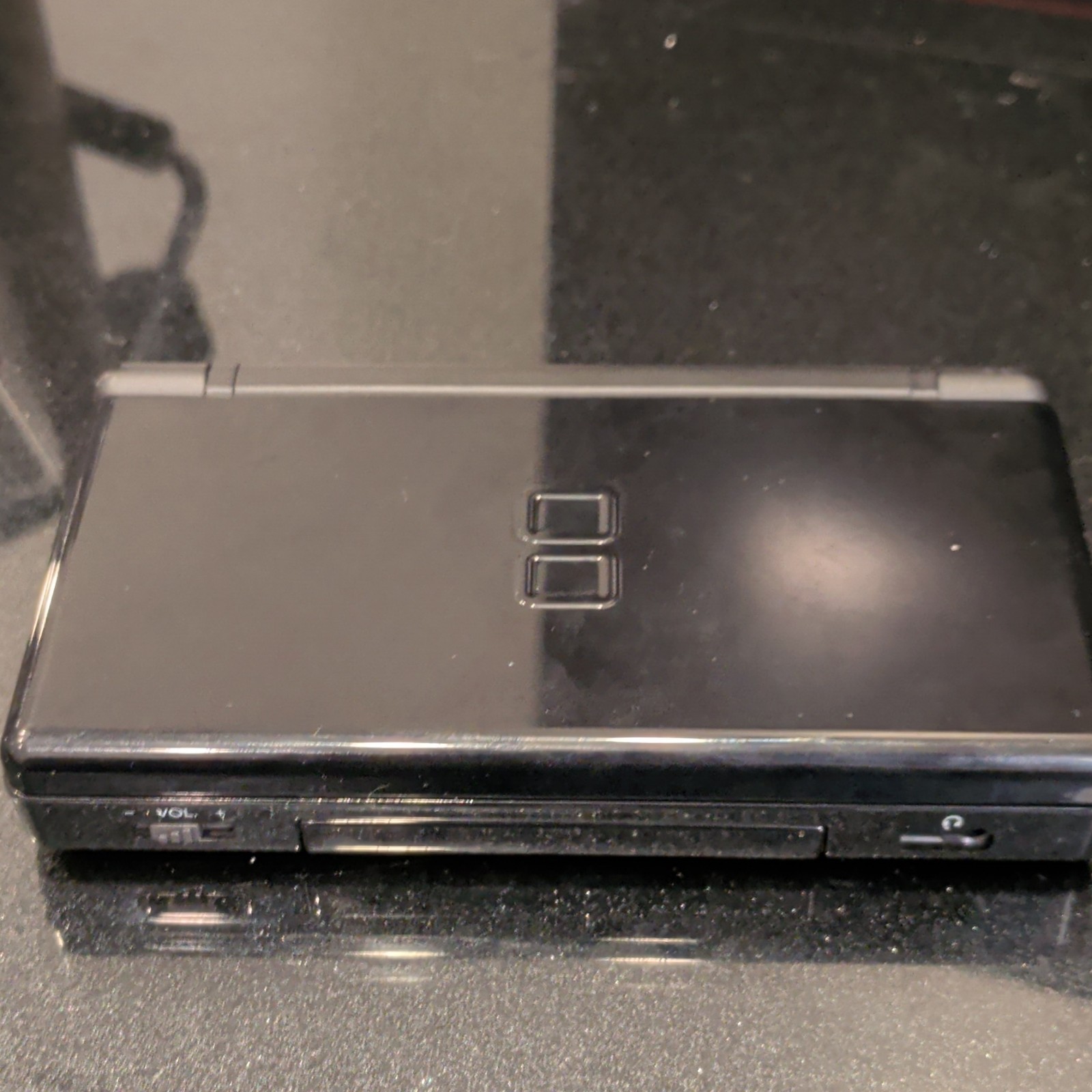 Nintendo DS Lite Black Dual Screen Console with R4 SDHC Dual-Core Cartridge