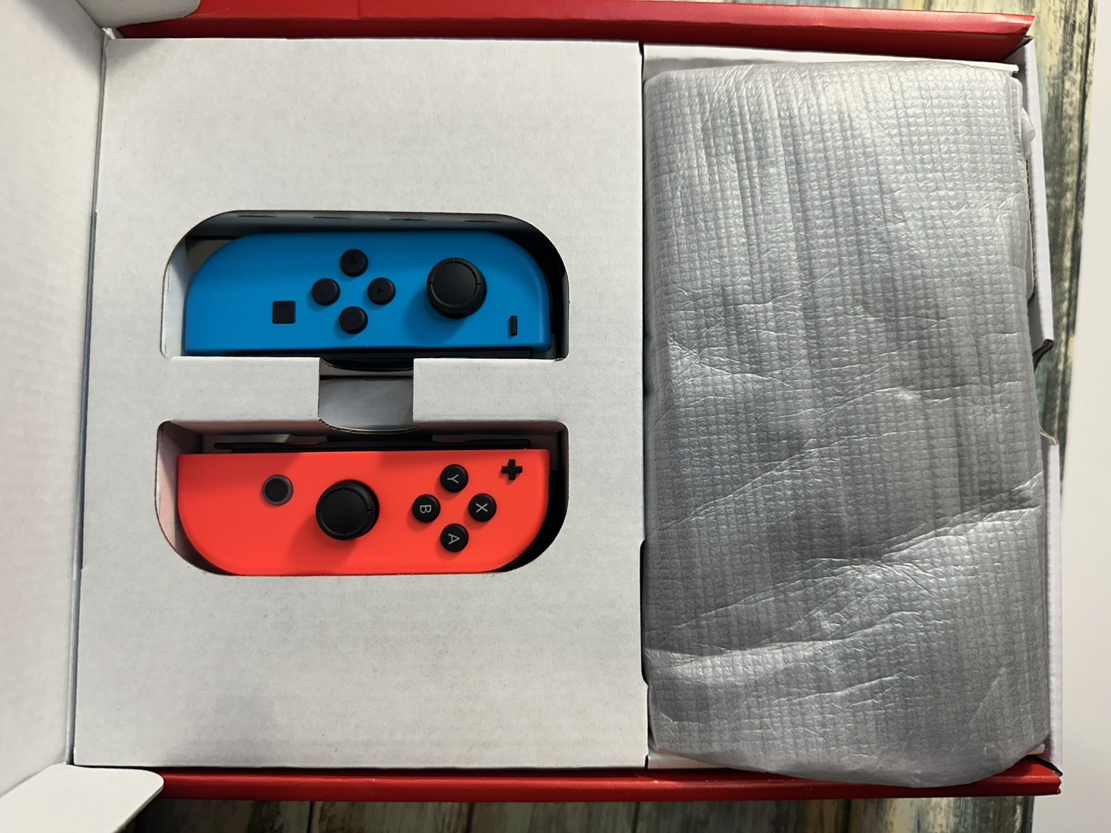 Nintendo Switch OLED Model w/ Neon Red & Neon Blue JoyCon Console + 2 JoyCons