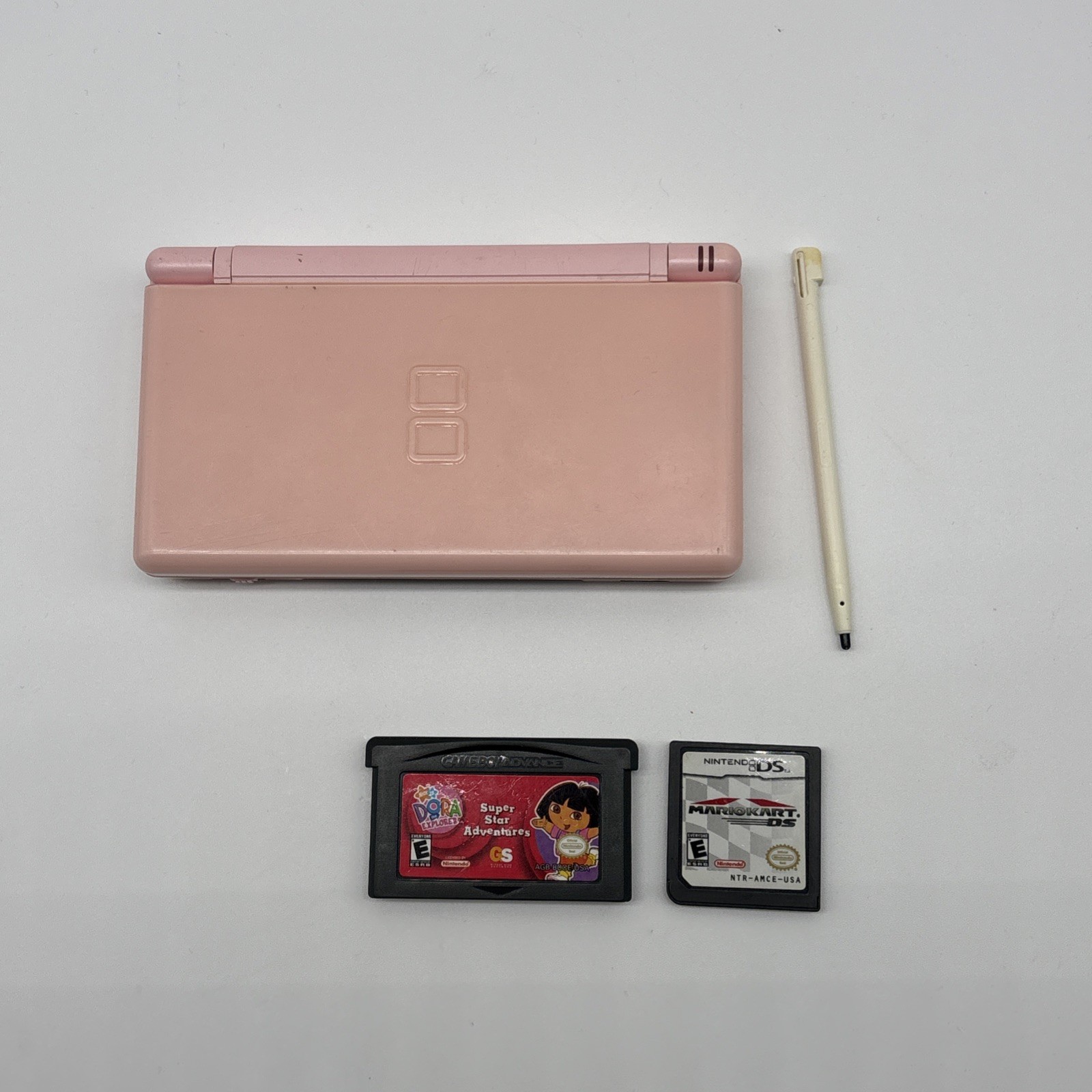 Nintendo DS Lite Metallic Rose W/ Mariokart & Dora – Stylus – NO CHARGER -WORKS