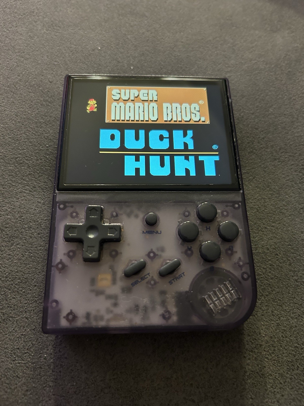 Anbernic RG35XX Handheld Game Console Purple Clear Headphone Jack Menu Button