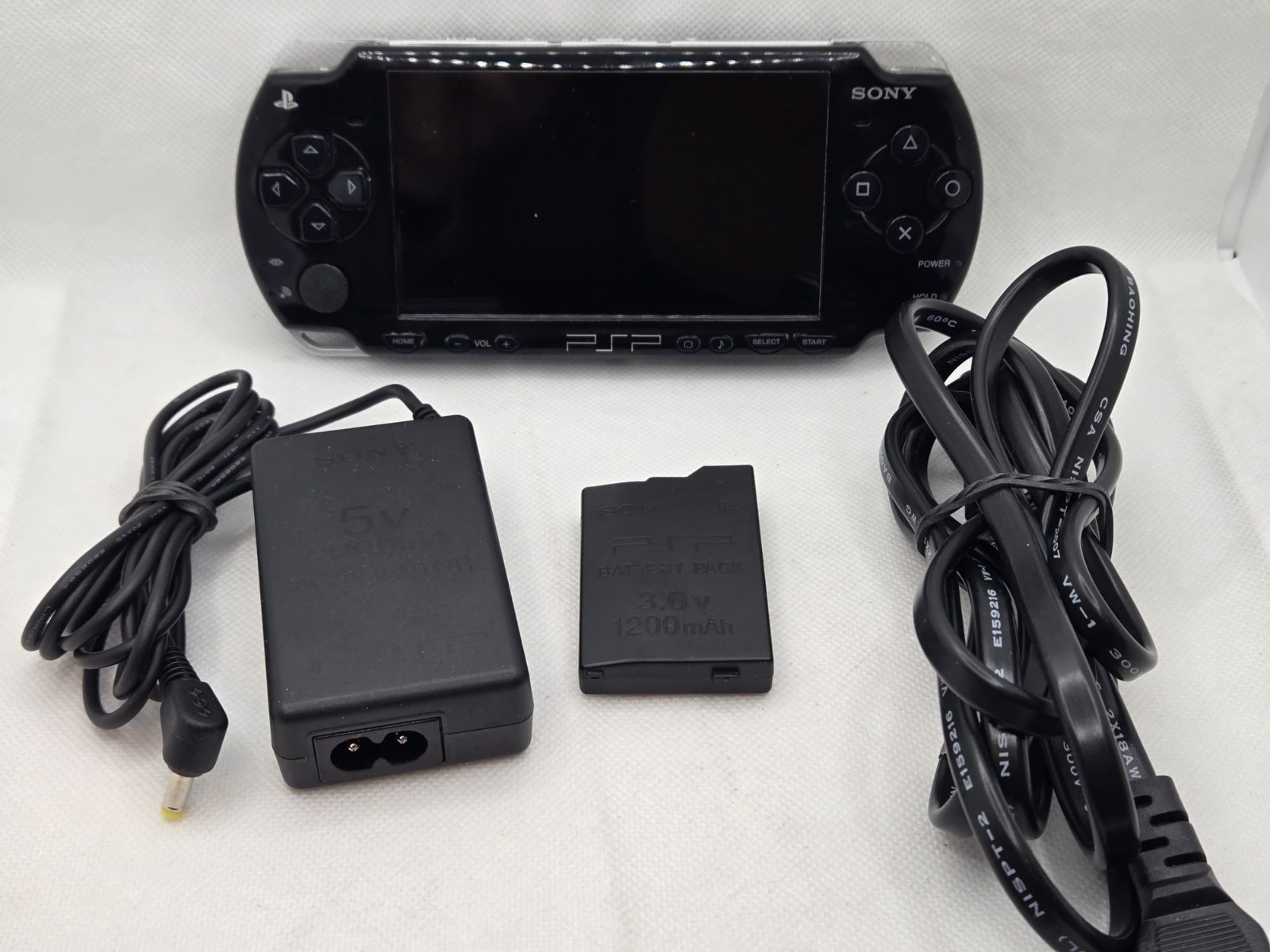 Sony PSP 2001 Piano Black – Charger, New Battery & 4GB Memory Card Included
