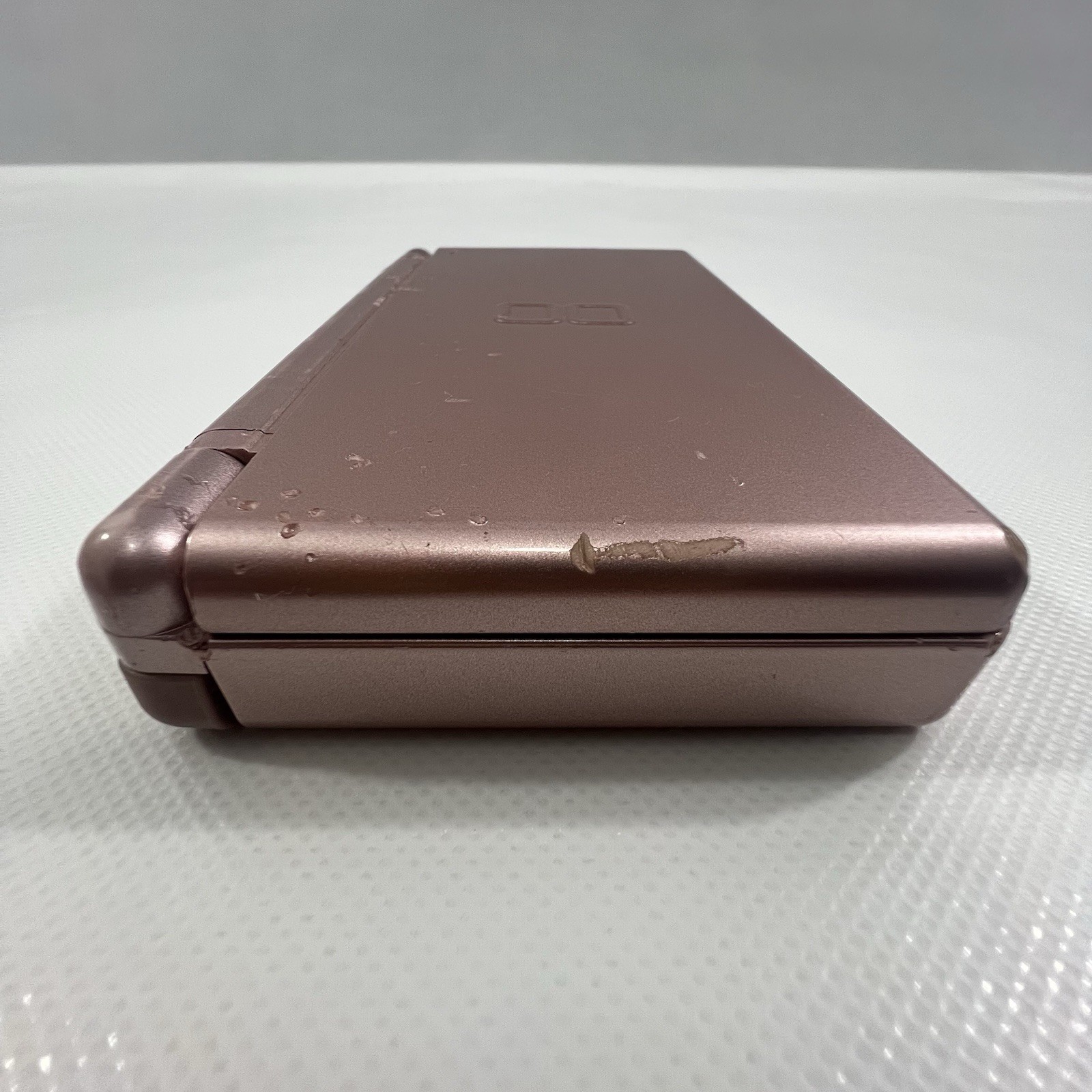 Nintendo DS Lite Handheld Console with Stylus and Wall Charger Has Bite Marks