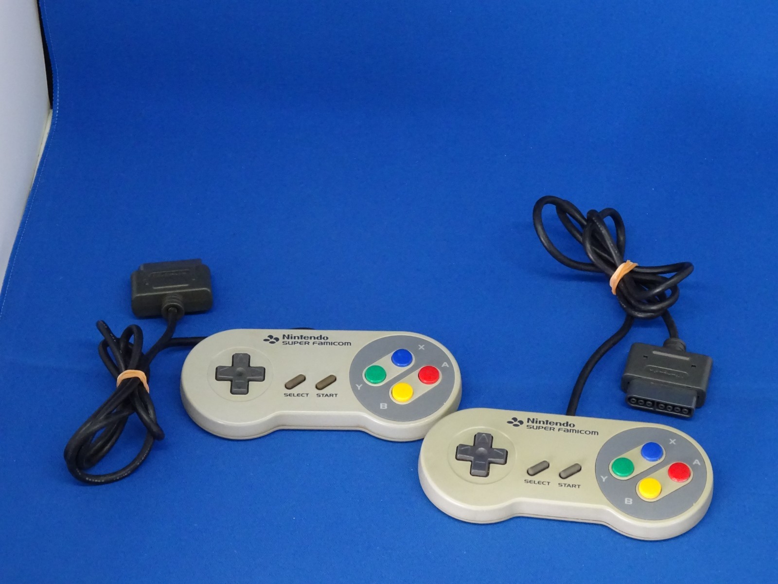 SNES case for Super Mario Kart, Super Mario World, and Super Picross.SNES shelf