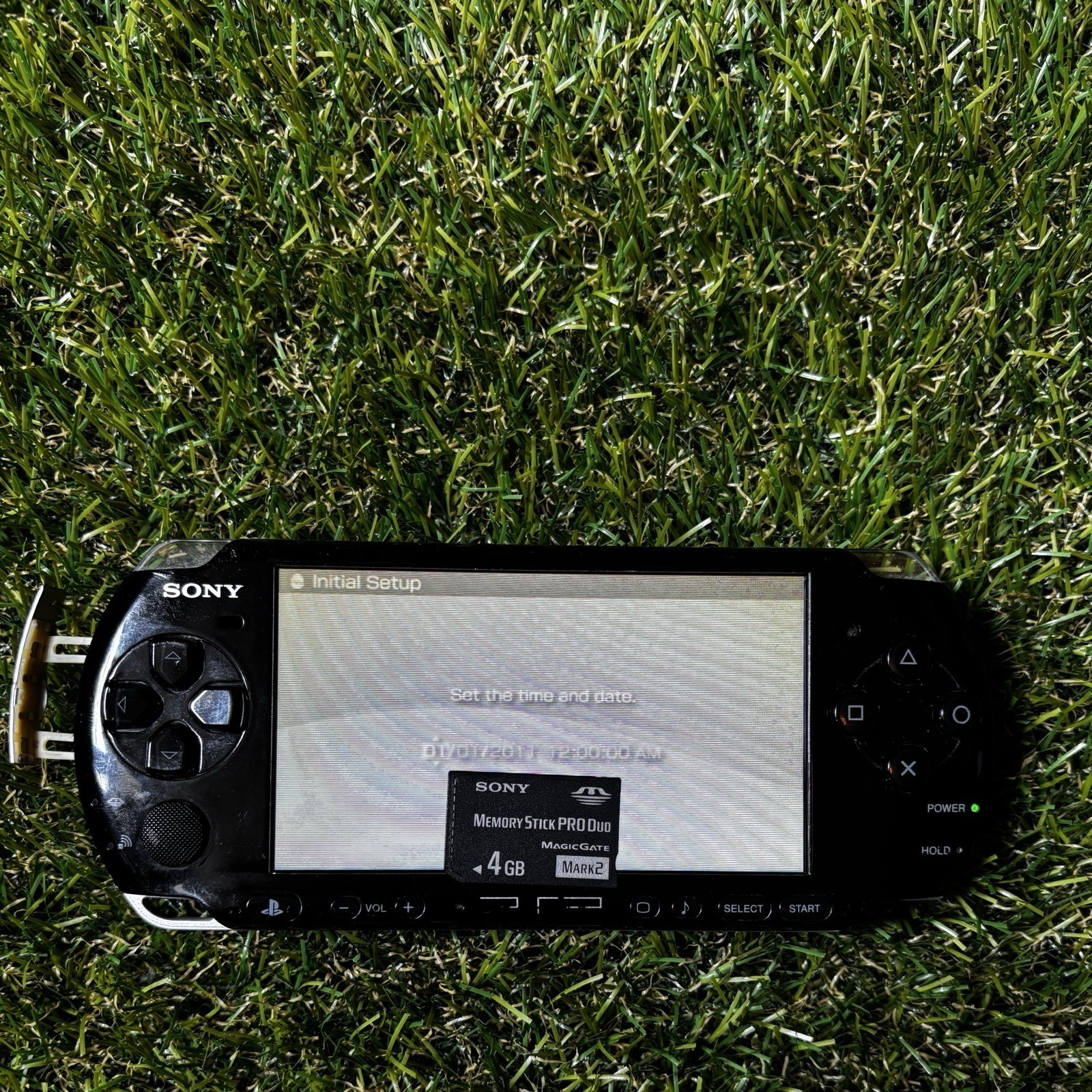 Sony PSP Black Handheld System, UMD Compatible, 4GB Memory Stick PRO Duo