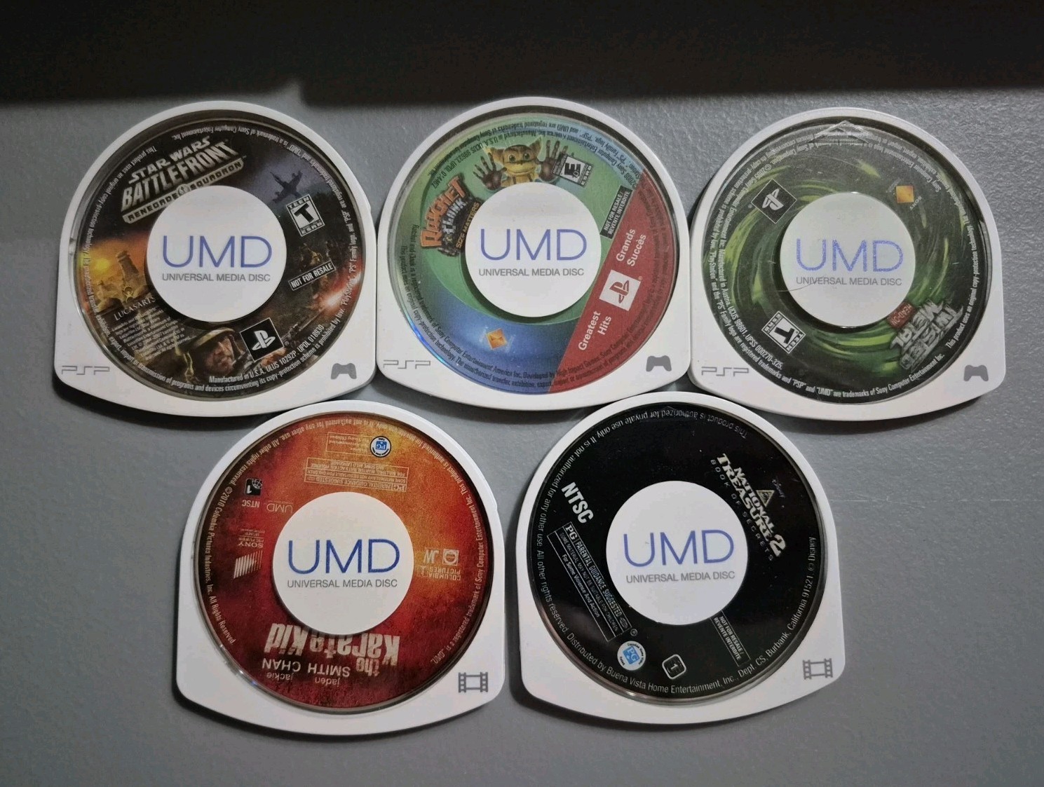 Sony PSP Silver w/ Games and Movies Lot Sale With Box and Accessories TESTED