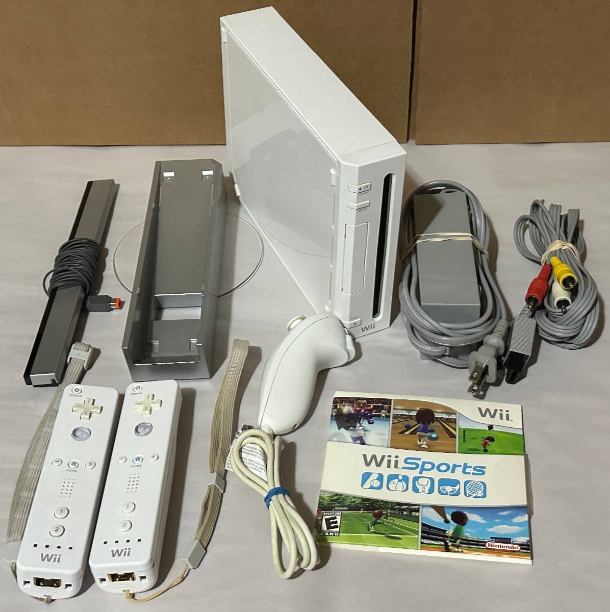 Nintendo Wii Game System White Console 2 Controller Bundle with Wii Sports Game