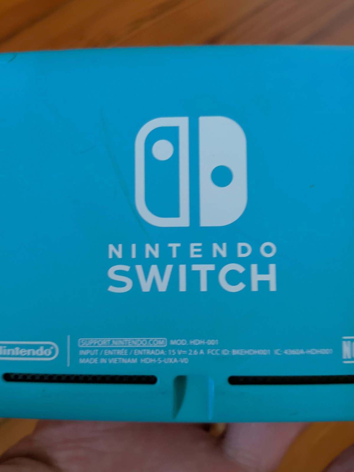 Nintendo Switch Lite Turquoise 32GB Console; Charger & Mario Odyssey Game – Fair
