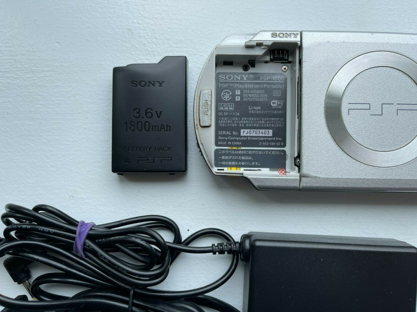 PSP-1000 Silver – Good Condition – OEM Japan Import US Seller