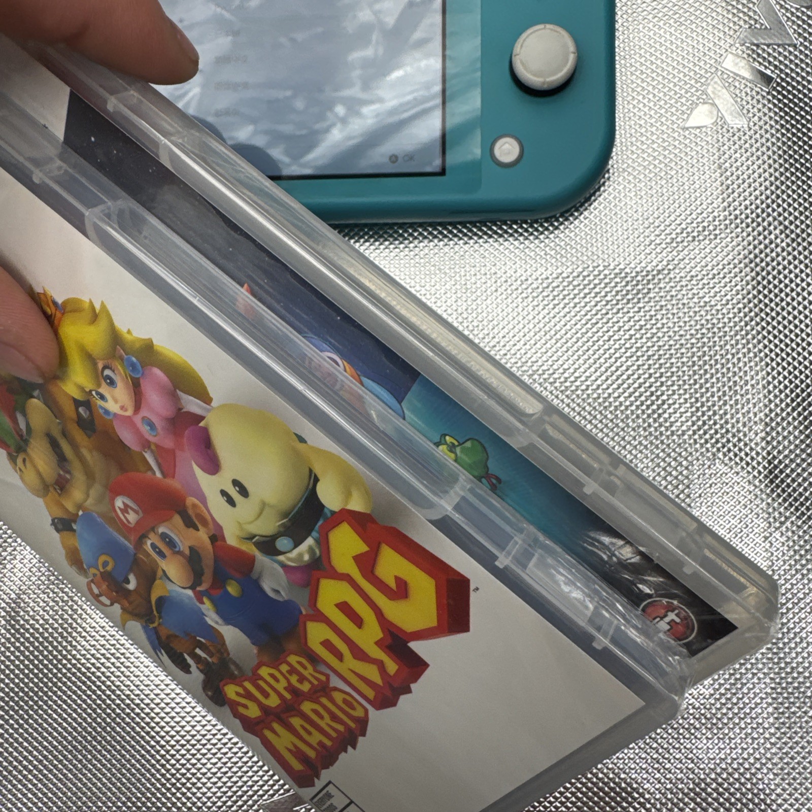 Nintendo Switch Lite 32GB Turquoise Handheld Gaming Console W/3 Games Mario Case