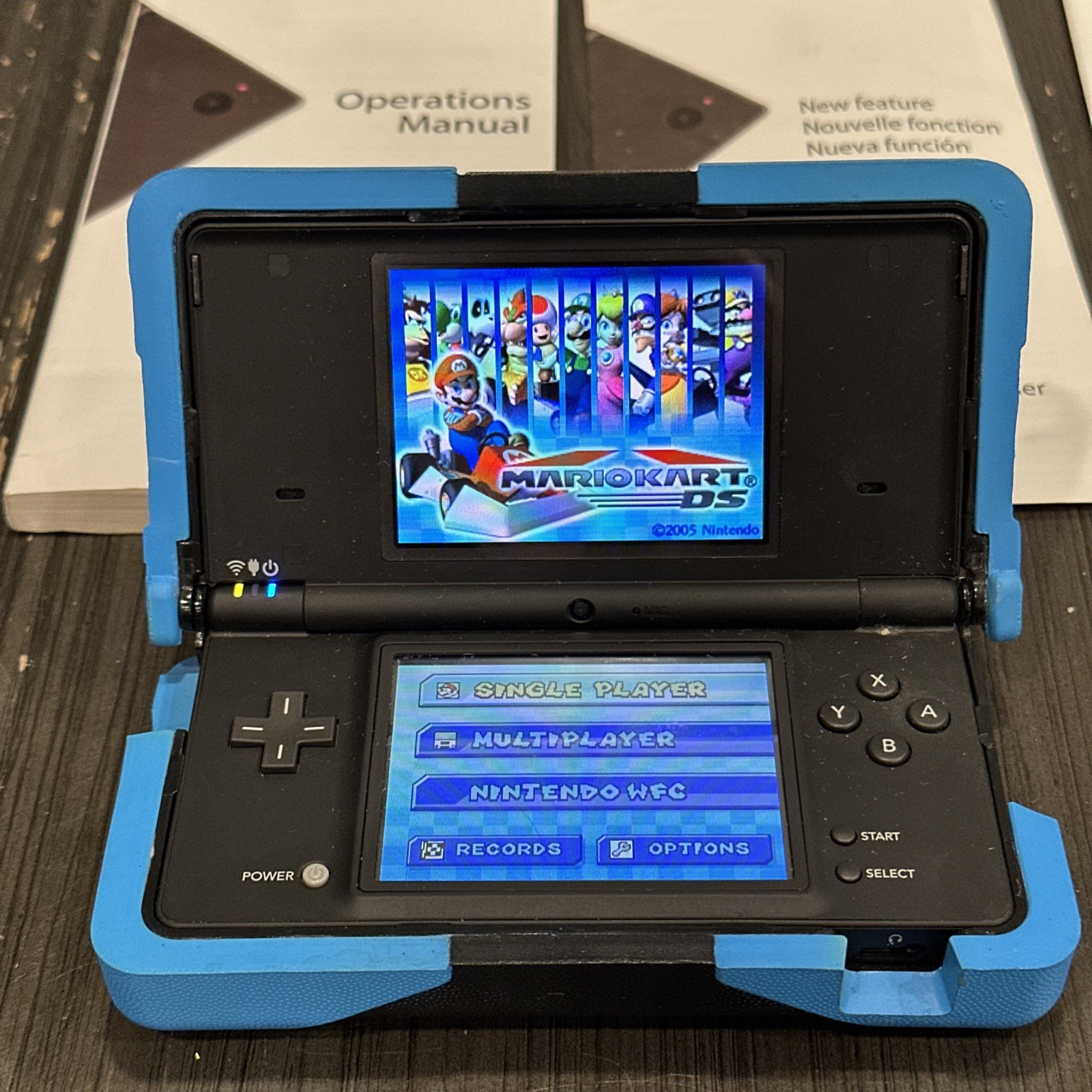 Nintendo DSi Edition Black Handheld System with Box, Nerf Case Mario kart DS