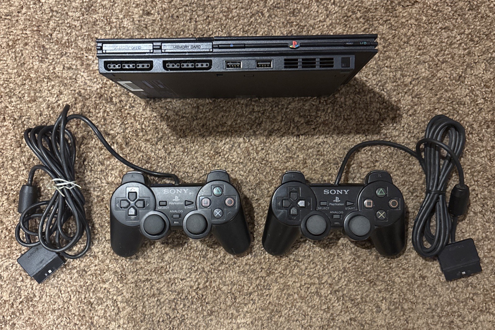 Sony PlayStation 2 Slim – Black (SCPH-79001) – 2 OEM Controllers & 19 Games Lot