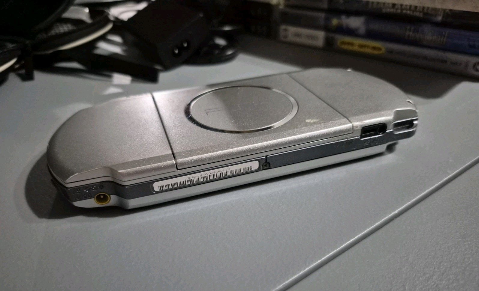 Sony PSP Silver w/ Games and Movies Lot Sale With Box and Accessories TESTED