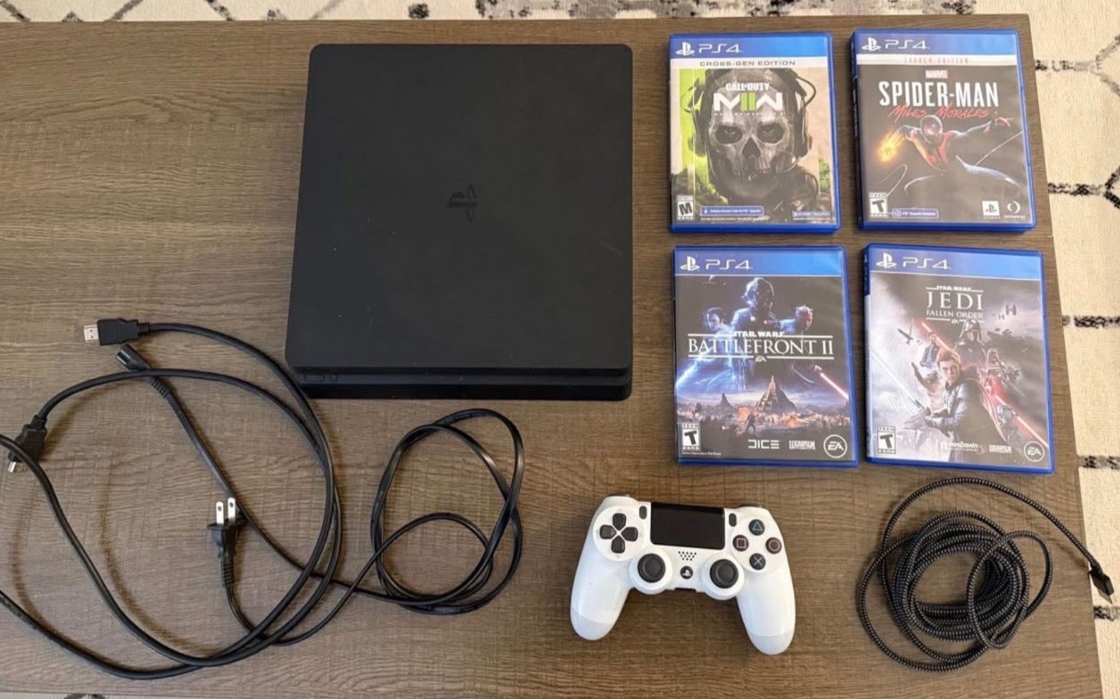 Sony PlayStation 4 Slim, 3 Dual Shock Controllers + 4 Games, HDMI & Ethernet