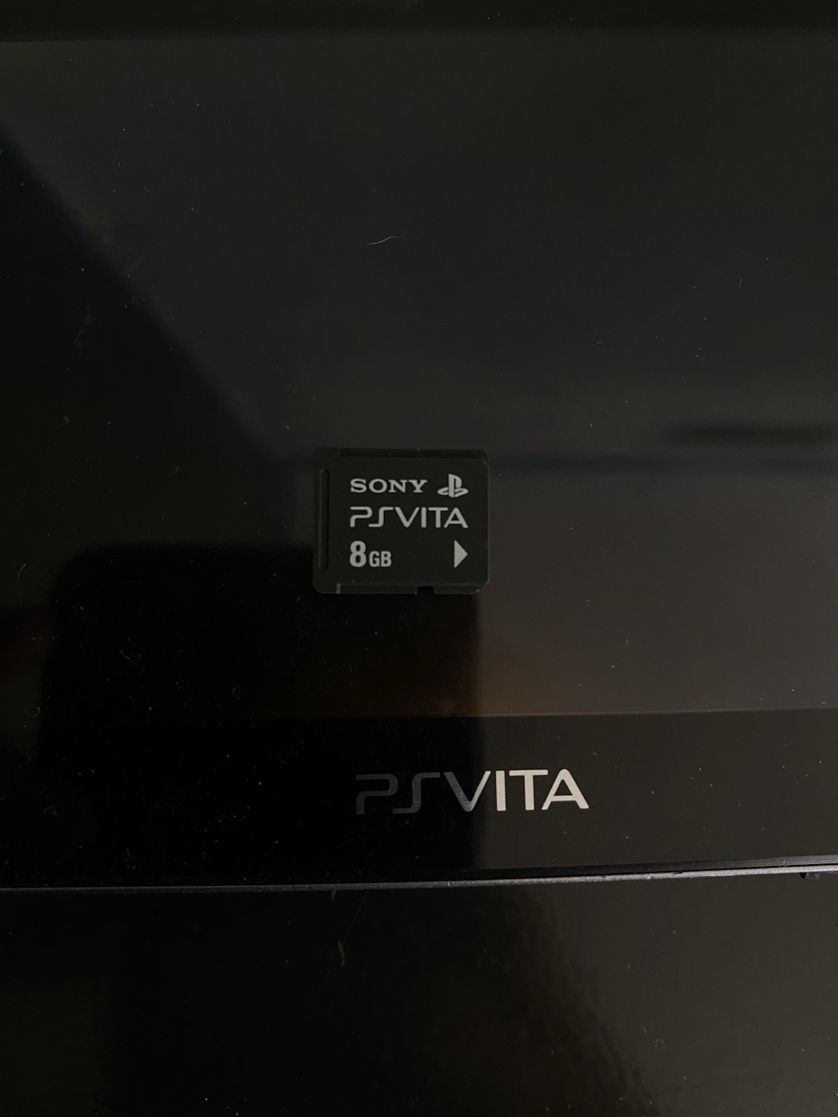 PSVita 1000 Crystal Black OLED With 8gb Storage Card