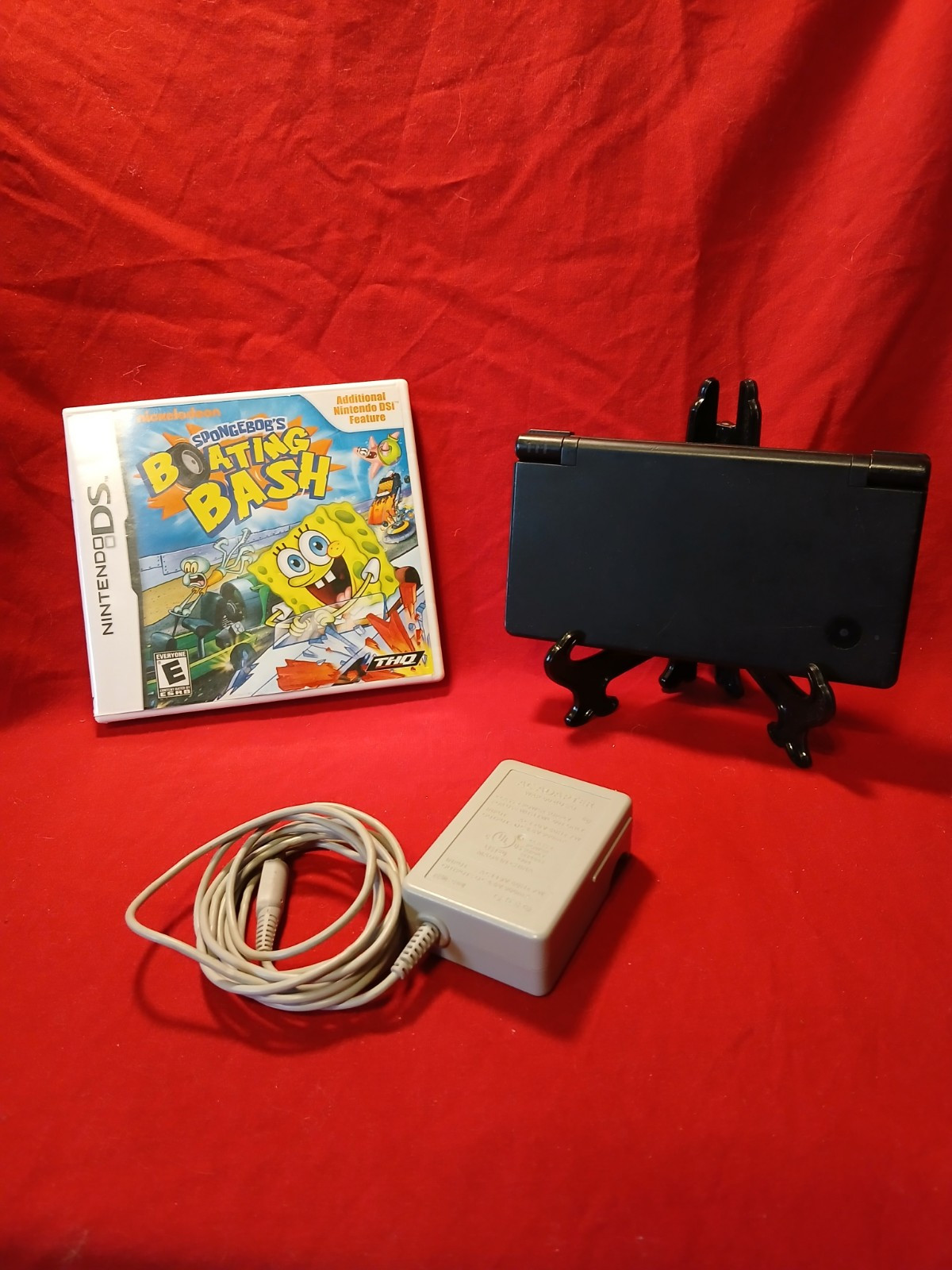 Nintendo DSi Black Handheld System With SpongeBob’s Boating Bash Game