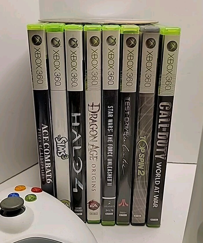 Microsoft Xbox 360 60GB HD Console, 2 Controllers & 8 Games + More.