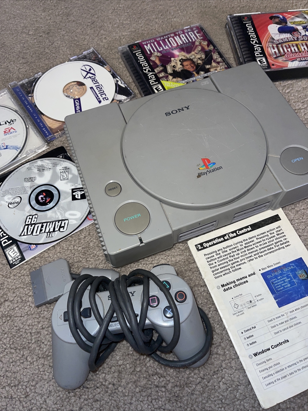 Play Station with games and remote/ no cords to hook up