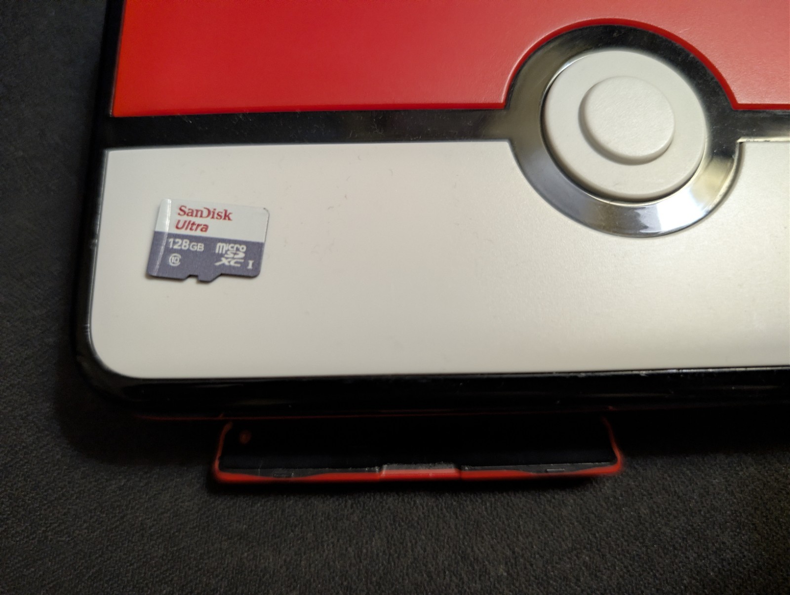 (Region Unlocked) Monster Ball New 2DS LL + 128GB MicroSD Card & 7 Games