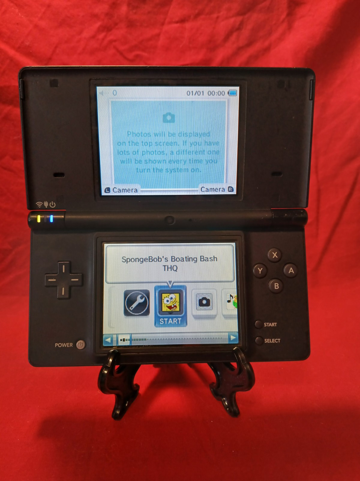 Nintendo DSi Black Handheld System With SpongeBob’s Boating Bash Game