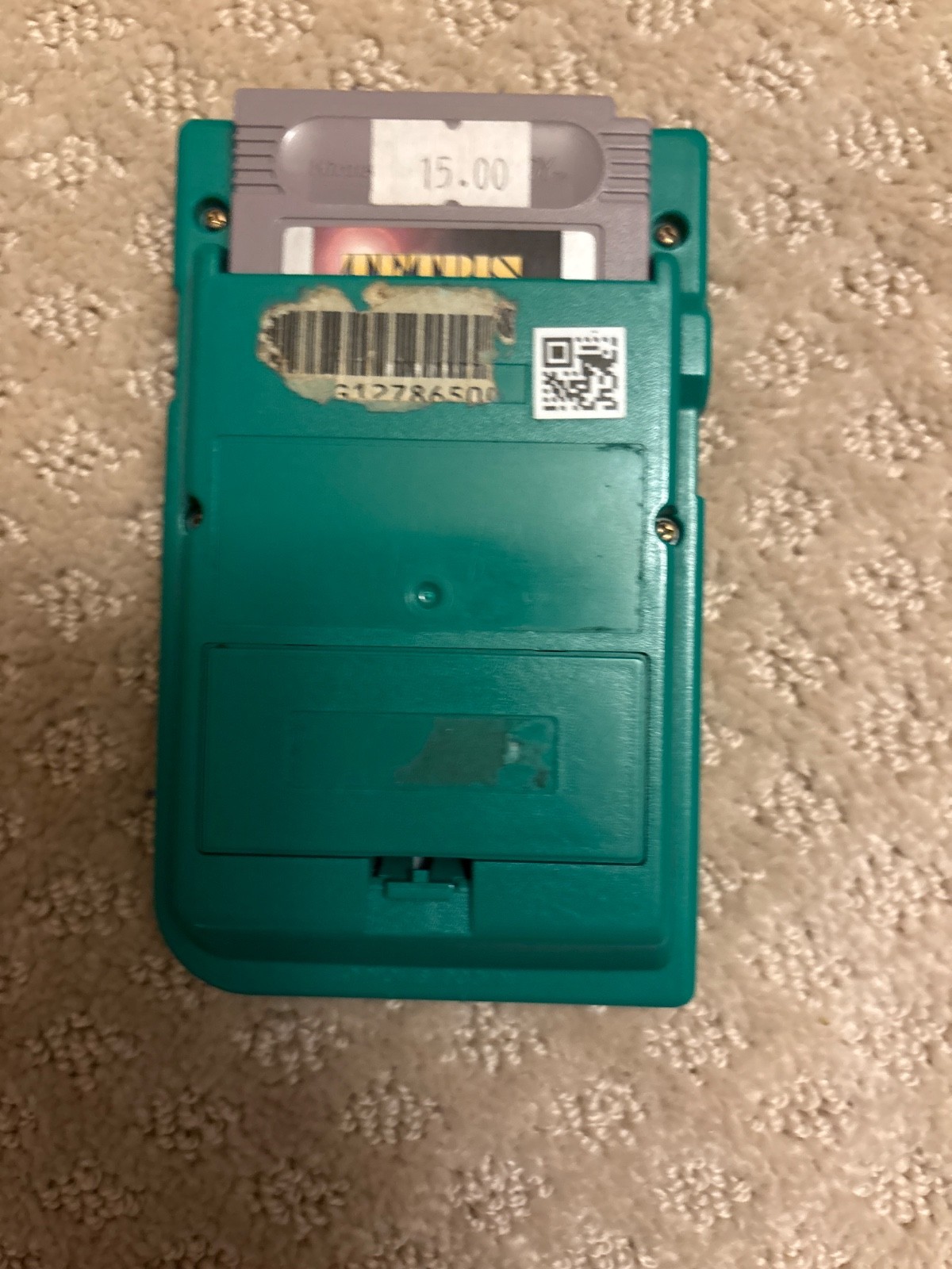 Comes with Tetris plus green hand held still works you might need to turn it off