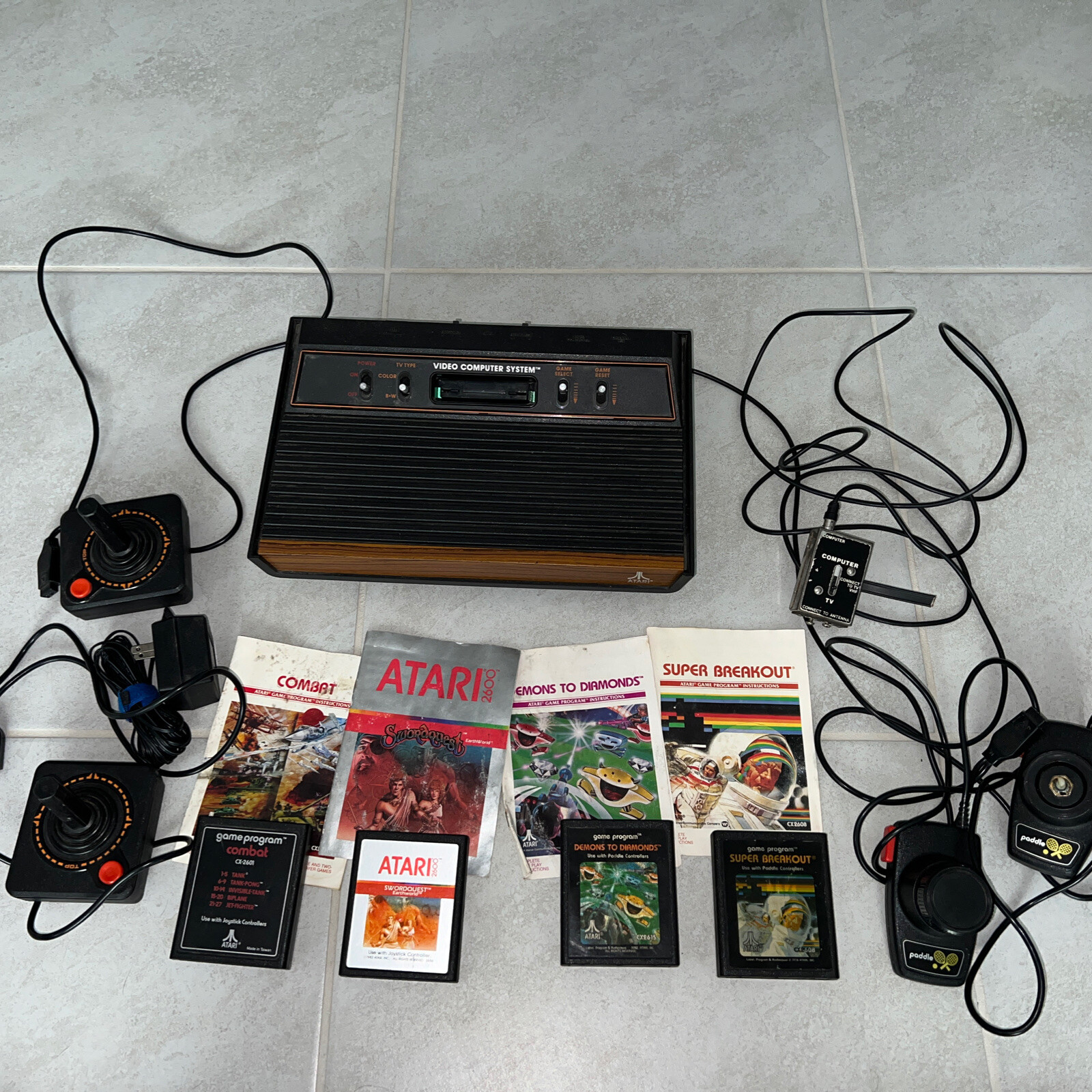 Atari (CX 2600 A) Video Game Console, 2 Controllers, 4 Games Read