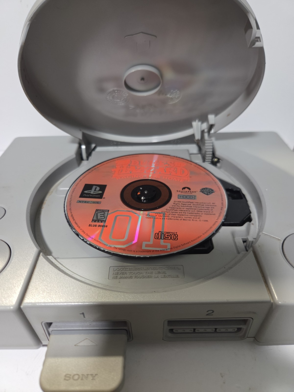 Sony PlayStation 1 Console W/ Dukes Of Hazzard Disc. Tested Working.