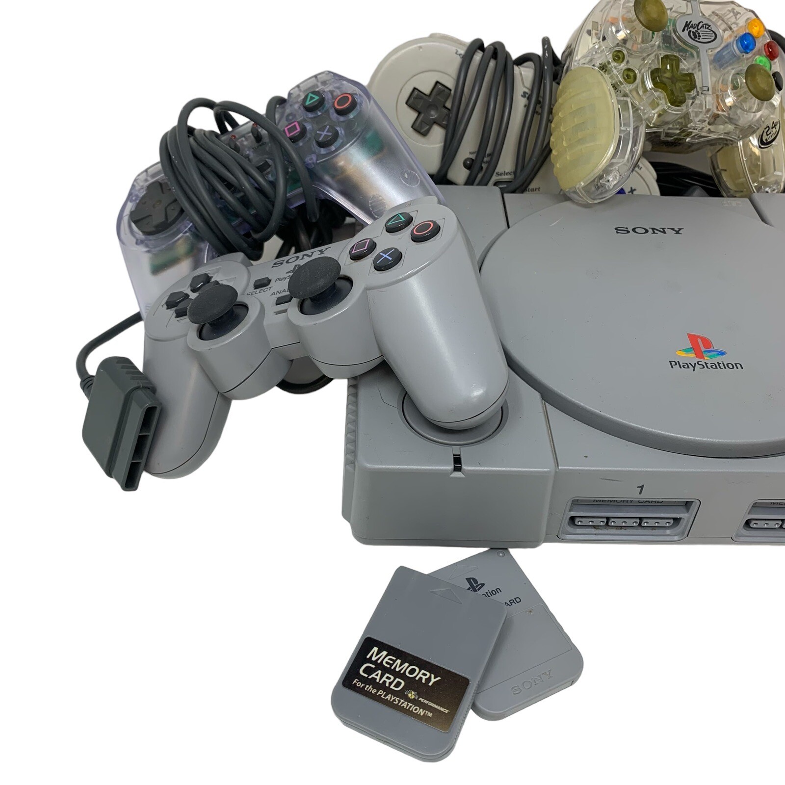 PlayStation System PS1 Bundle Cords 4 DualShock Controllers 2 Memory Cards