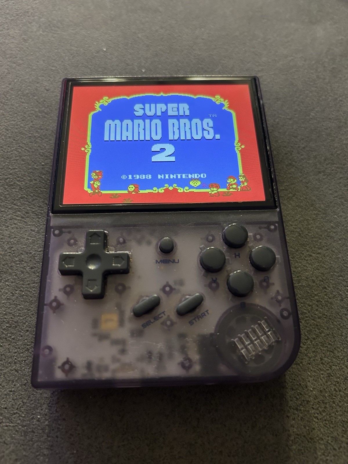 Anbernic RG35XX Handheld Game Console Purple Clear Headphone Jack Menu Button